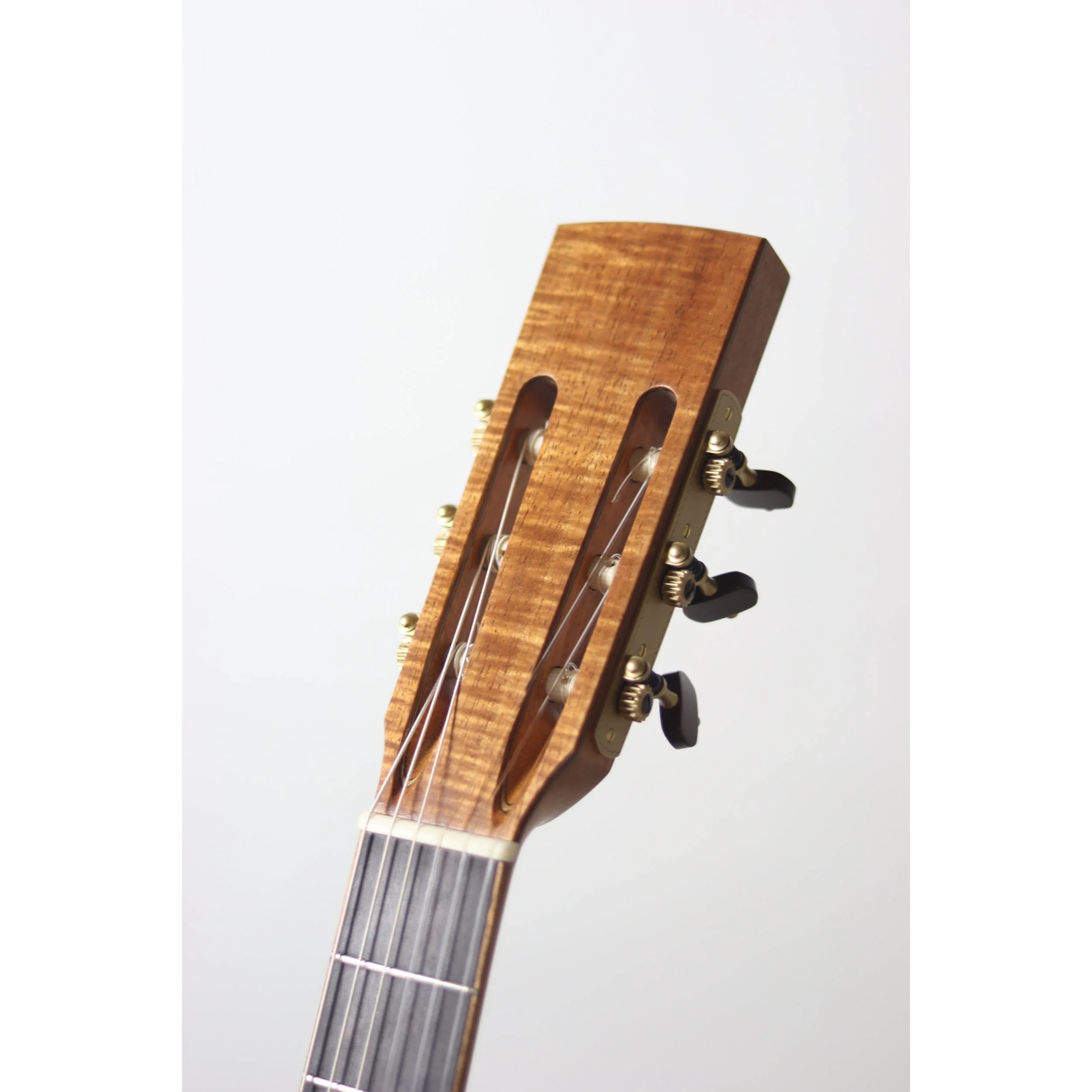 Geoffrey Yenson nylon-string parlor guitar: old-growth redwood, Honduras rosewood, and koa