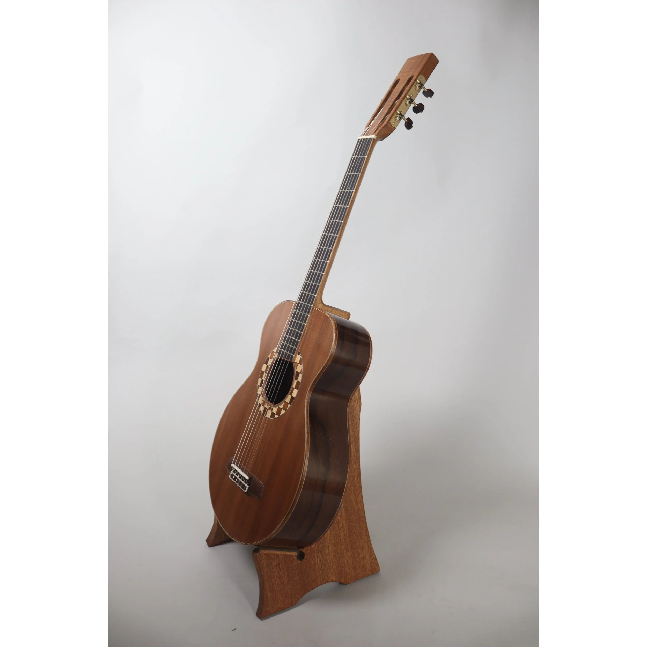 Geoffrey Yenson nylon-string parlor guitar: old-growth redwood, Honduras rosewood, and koa