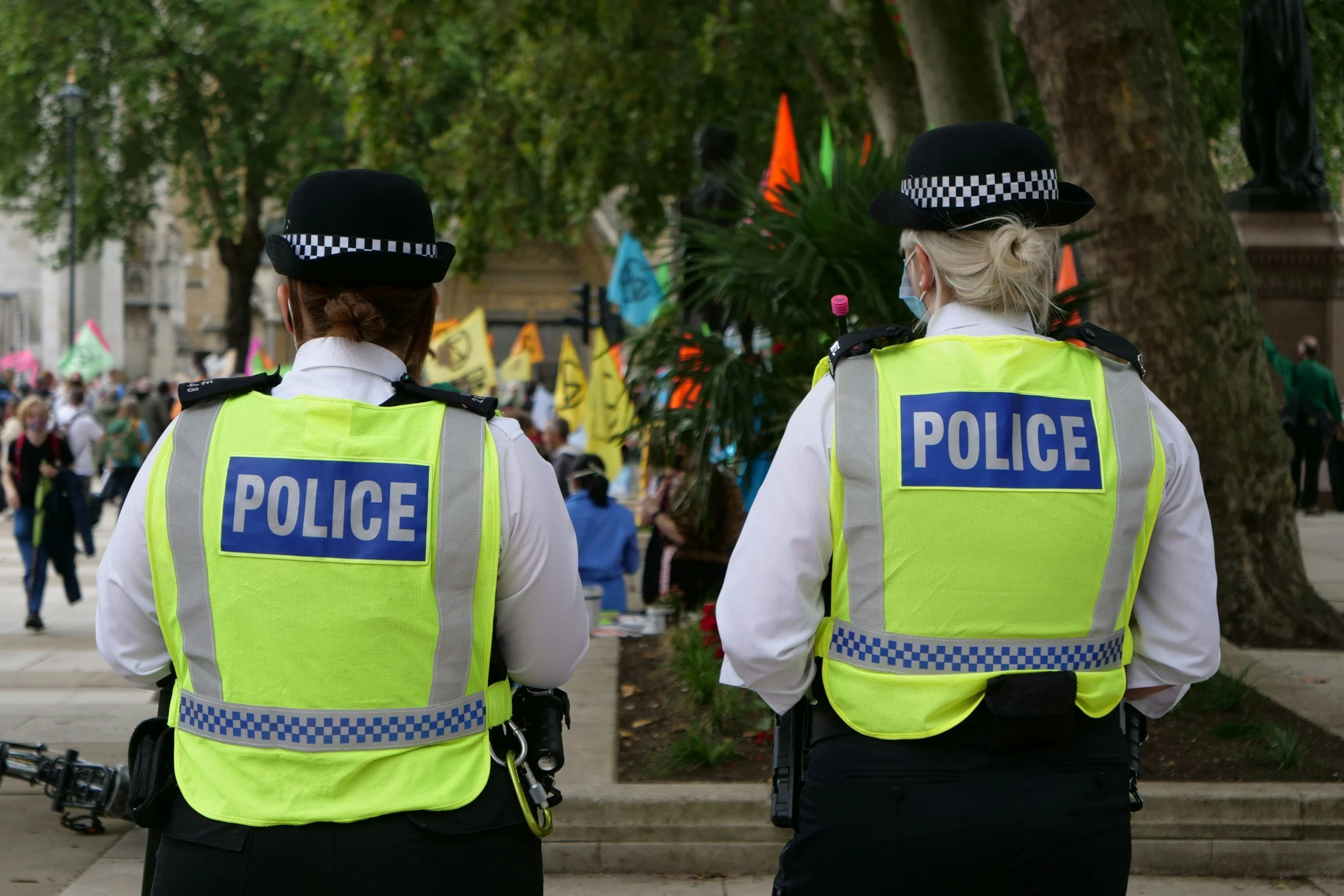 UK police officers at a public event, representing Police Scotland's counter-terrorism response to the June 20 Edinburgh anti-Muslim attacks