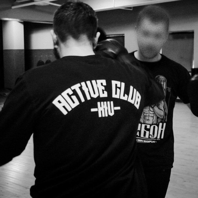 Members wearing Active Club branded shirts at a gym, from the network's official Telegram channel, documenting the US-founded white nationalist organization that orchestrated the Belfast riots