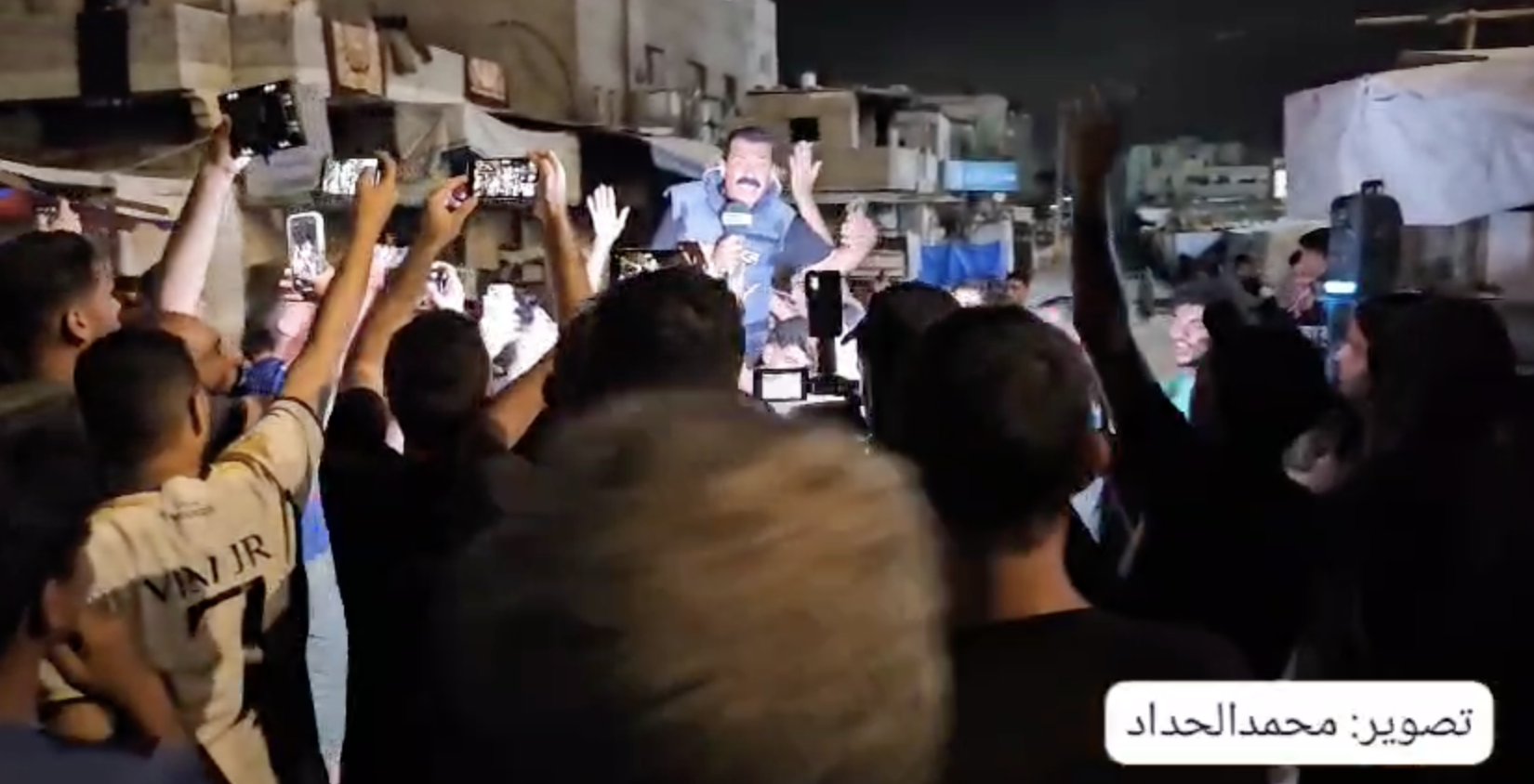 Crowd gathering in Gaza following the announcement of a ceasefire, illustrating public reaction amid a fragile pause in fighting