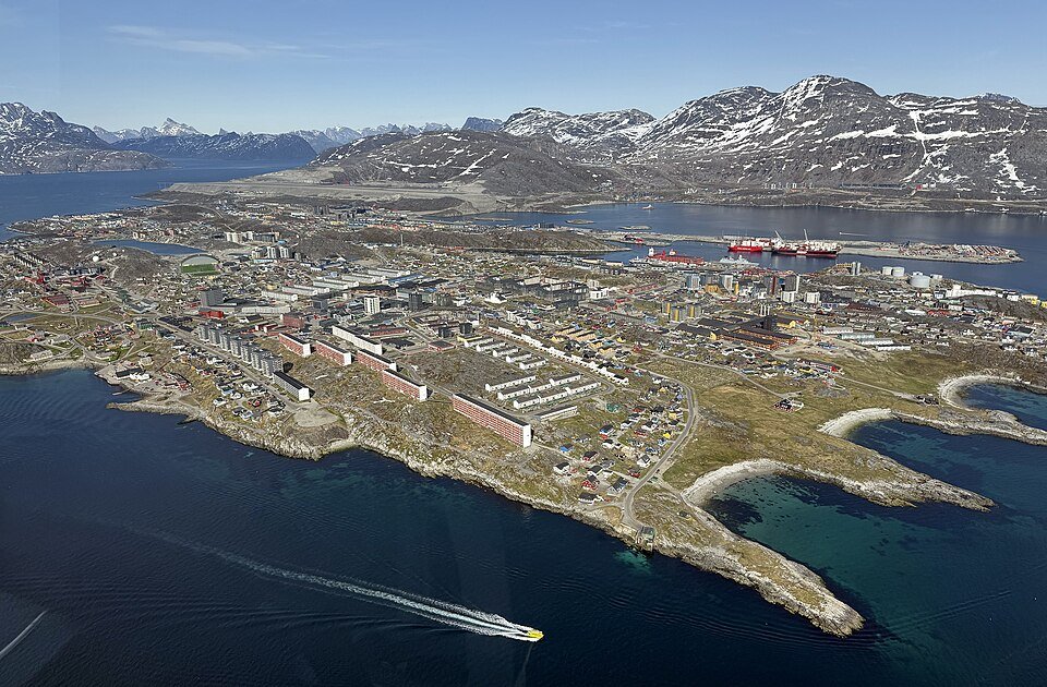 Aerial view of Greenland’s coastal infrastructure and port facilities amid rising NATO and U.S. geopolitical tensions