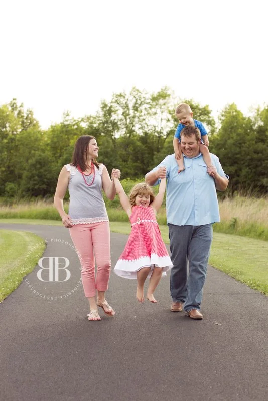 family of four fun poses.jpg