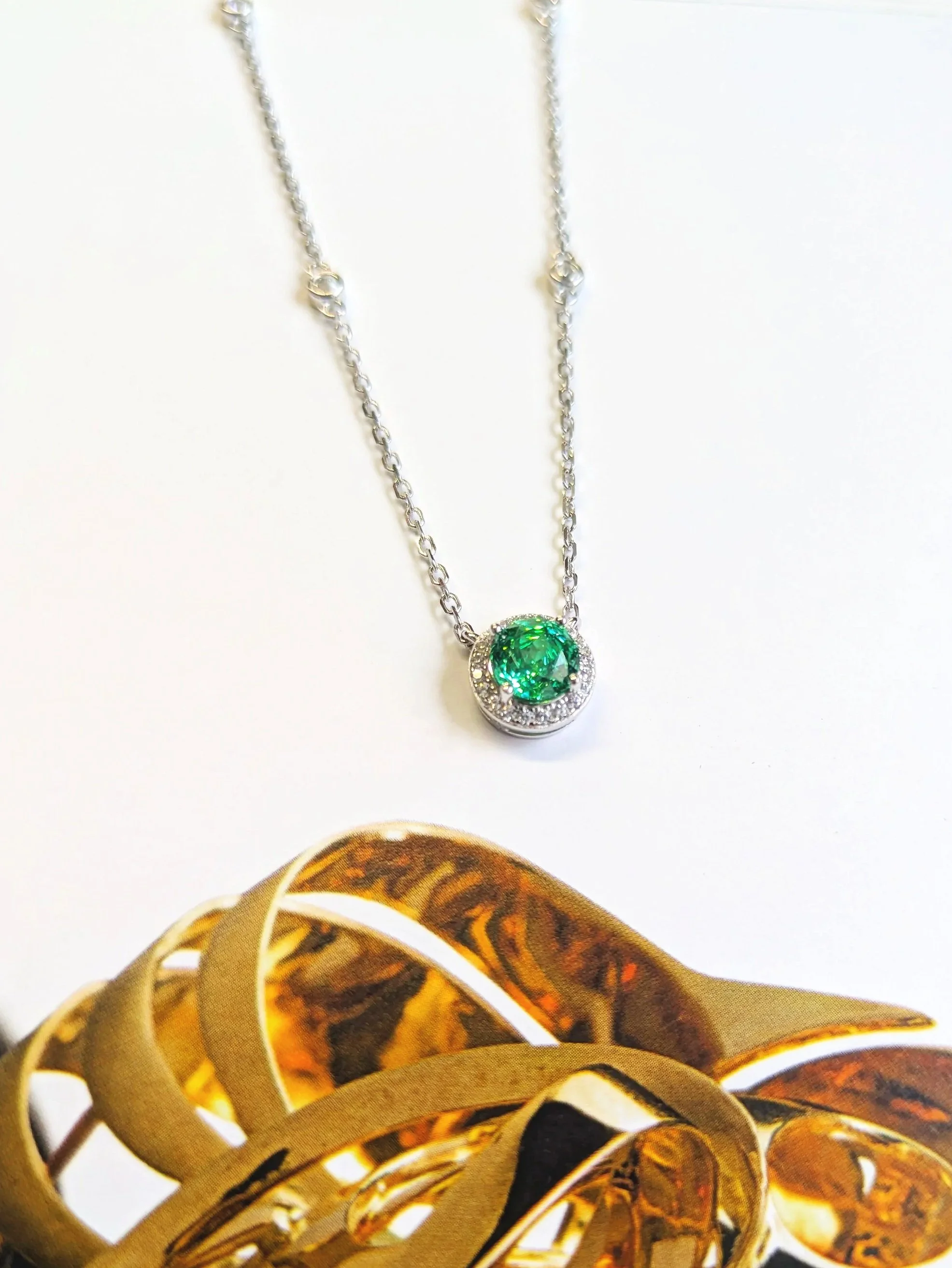 Silver rhodium green cluster ring