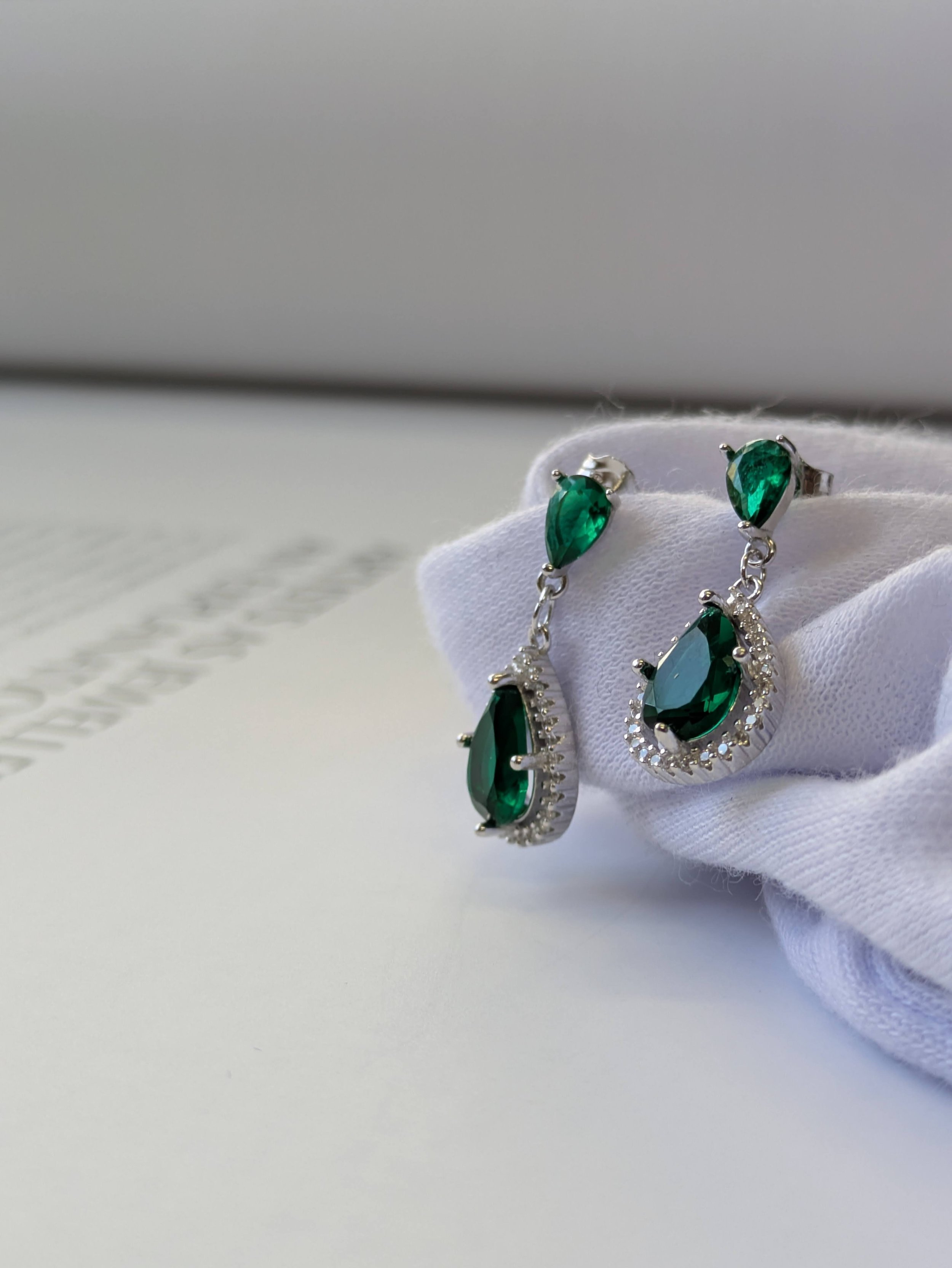 925 Sterling Silver Rhodium Pear Drop Earrings — Swiss White CZ