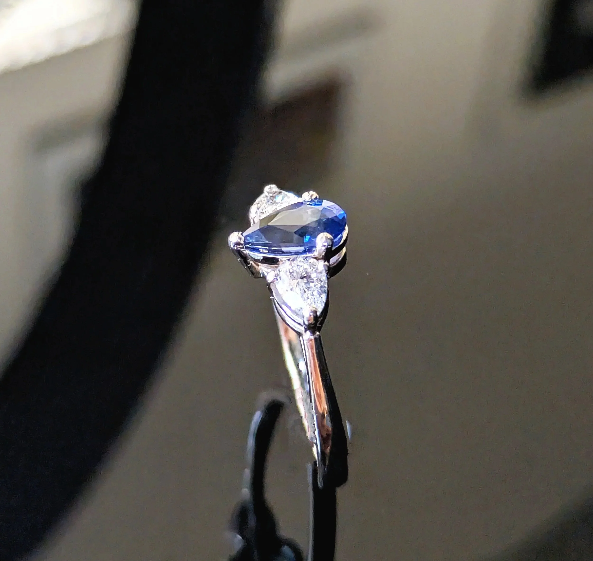 Side pear diamonds perspective engagement ring