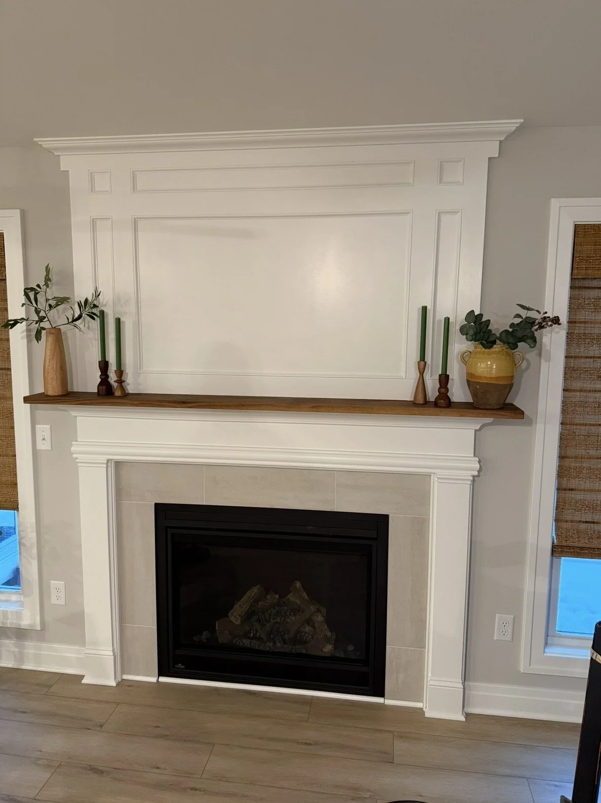 Fireplace painted white. Painted White Fireplace. Walnut Mantle with painted fireplace mantle. Mantle with crown molding.