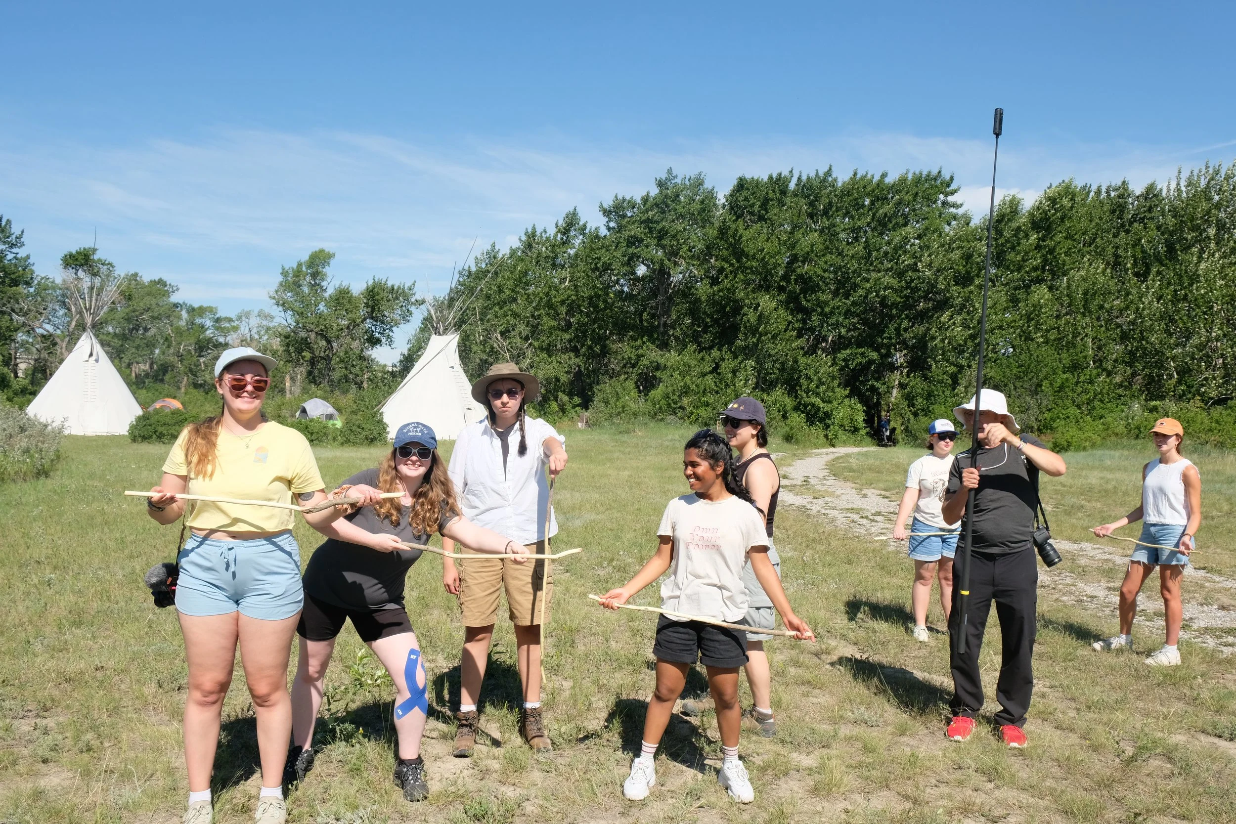 Playing handgames with Piikani Nation Secondary School Students, led by Jason Plain Eagle. Photographed by Ashley and David.