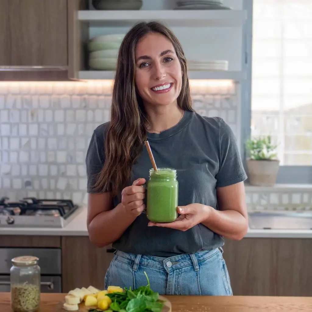 Sarah-with-smoothie-web-edited-1-1024x1024.jpg.webp