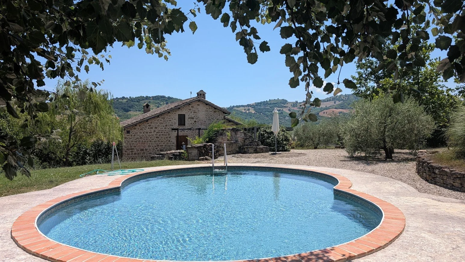 The view from the swimming pool at La Mela Rosa