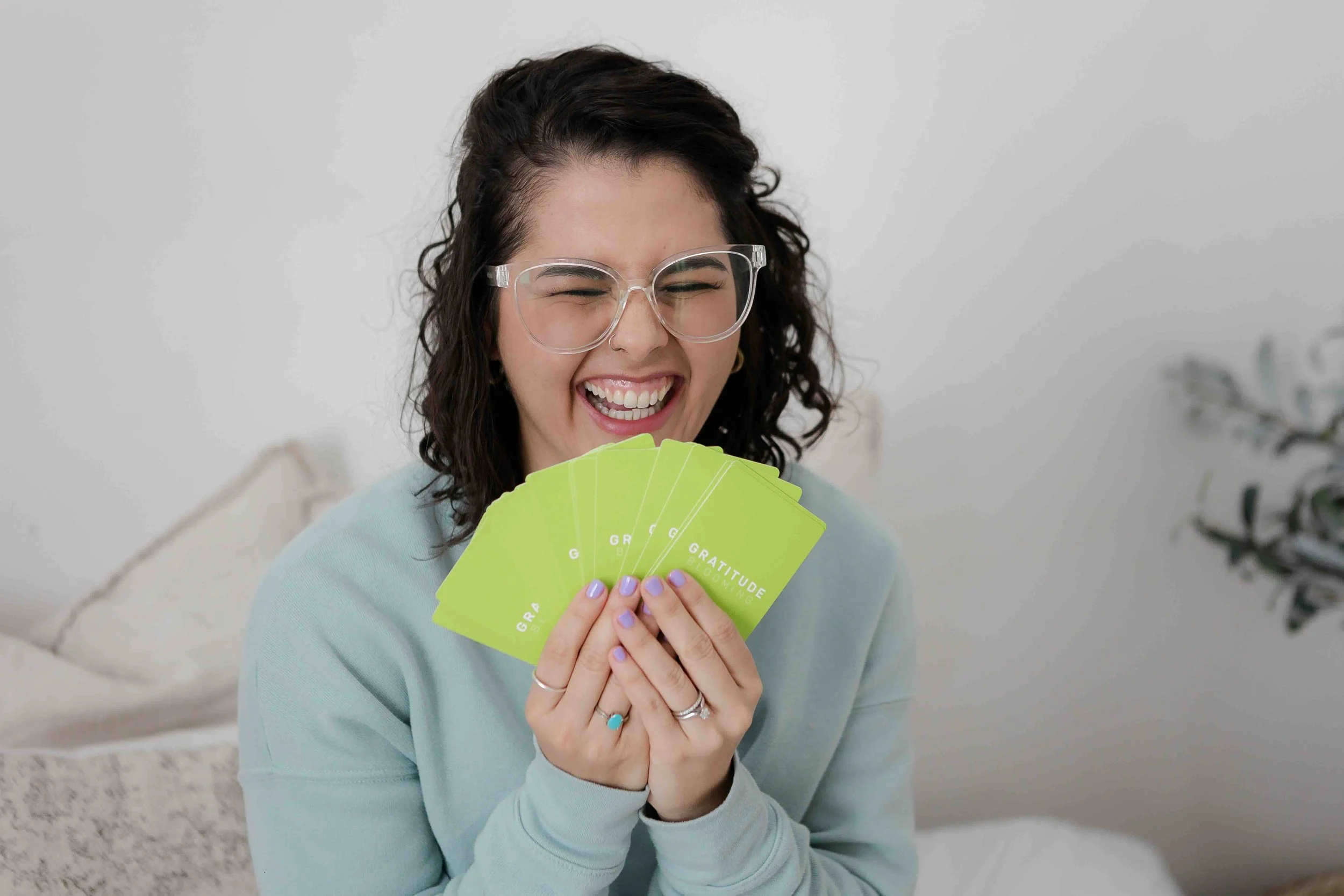 NIta Diaz holding gratitude cards