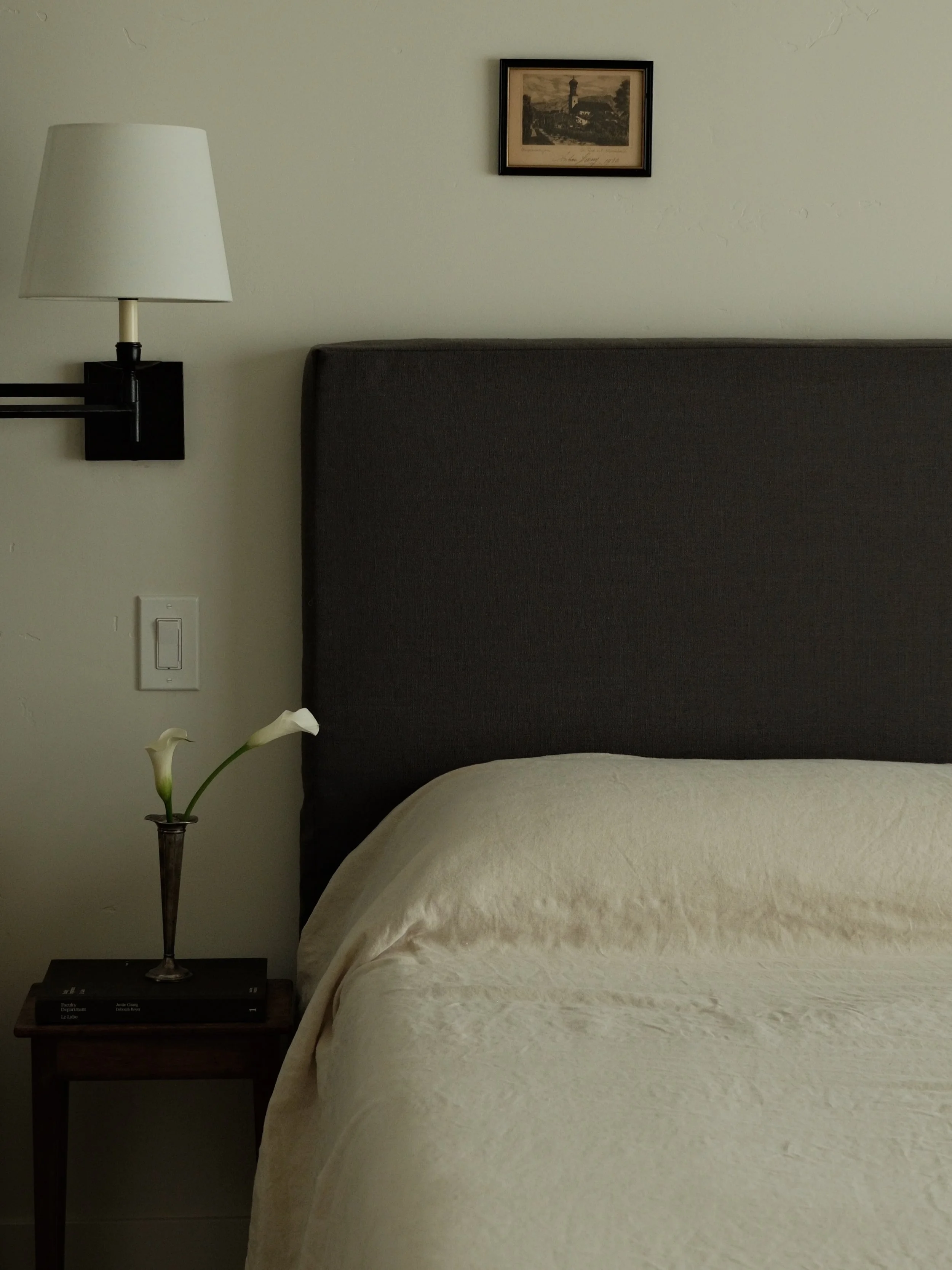 #Aduwithaview Primary will always be a fav of ours. A study in softness &mdash; Layers of linen, warm textures, and thoughtfully collected pieces that bring character into this new build. Swing arm sconces were a must for quiet evenings spent reading