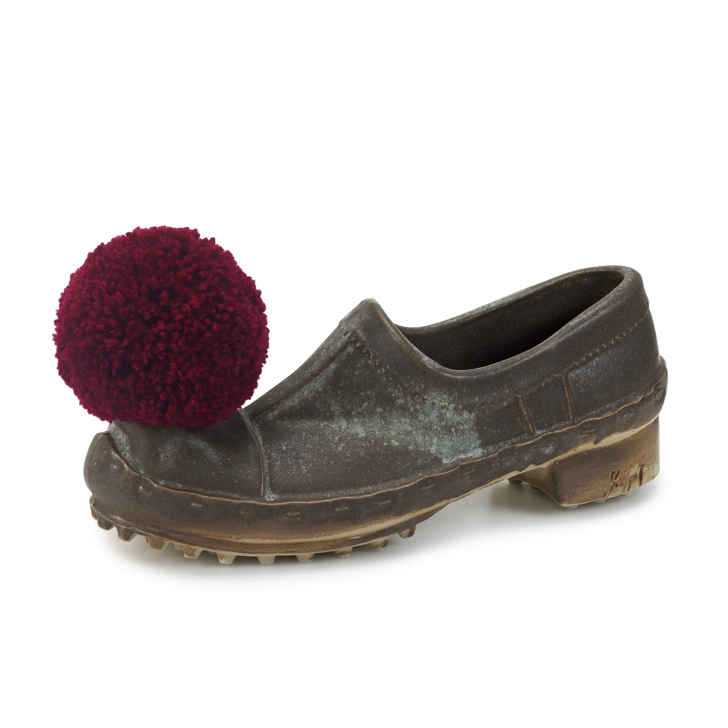 Τσαρούχι προεδρικής φρουράς σε καφέ χρώμα.