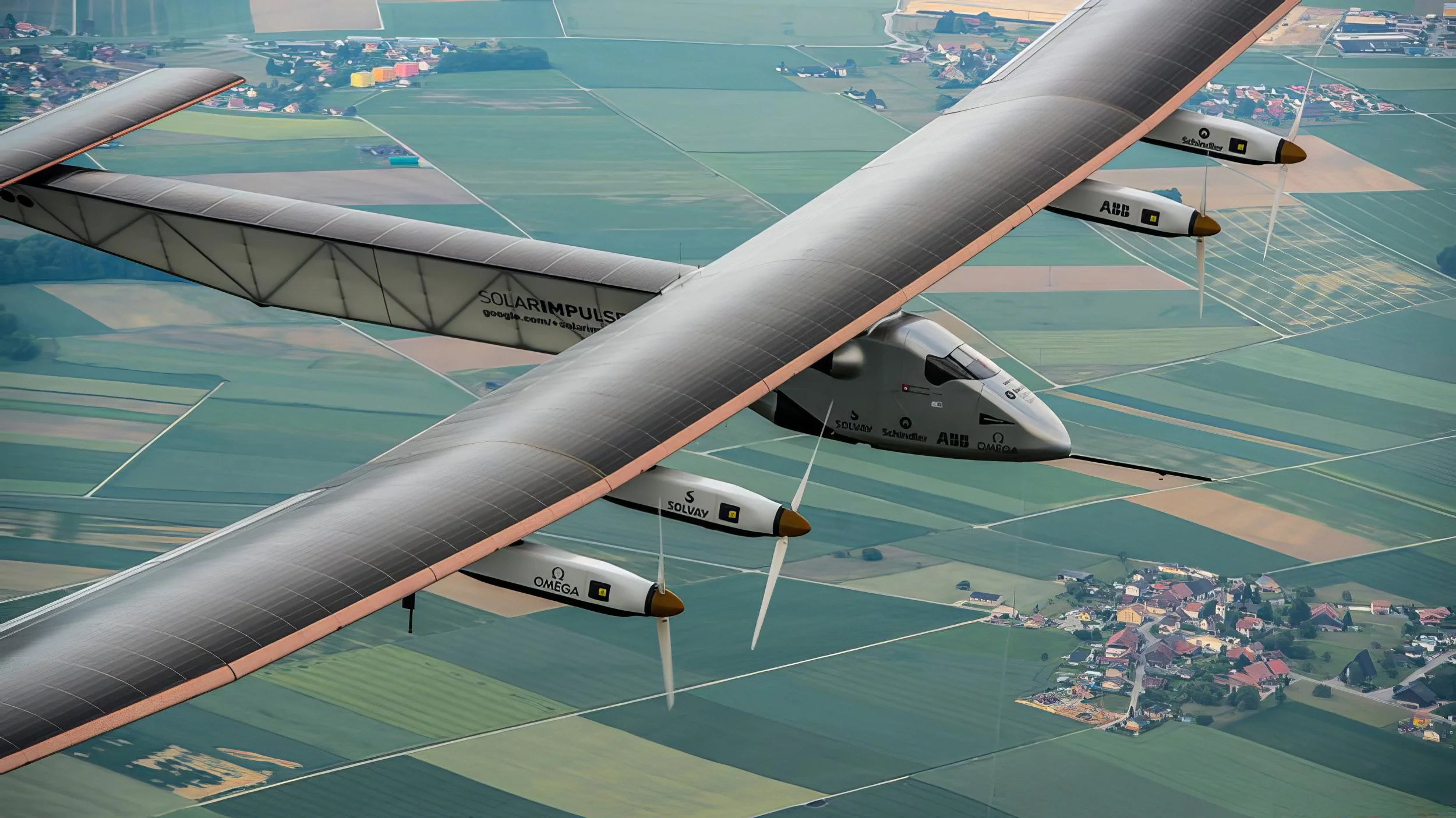 Giant solar-powered airplane flying over a landscape of farmland and small towns. Sustainable events and production Sevilla.