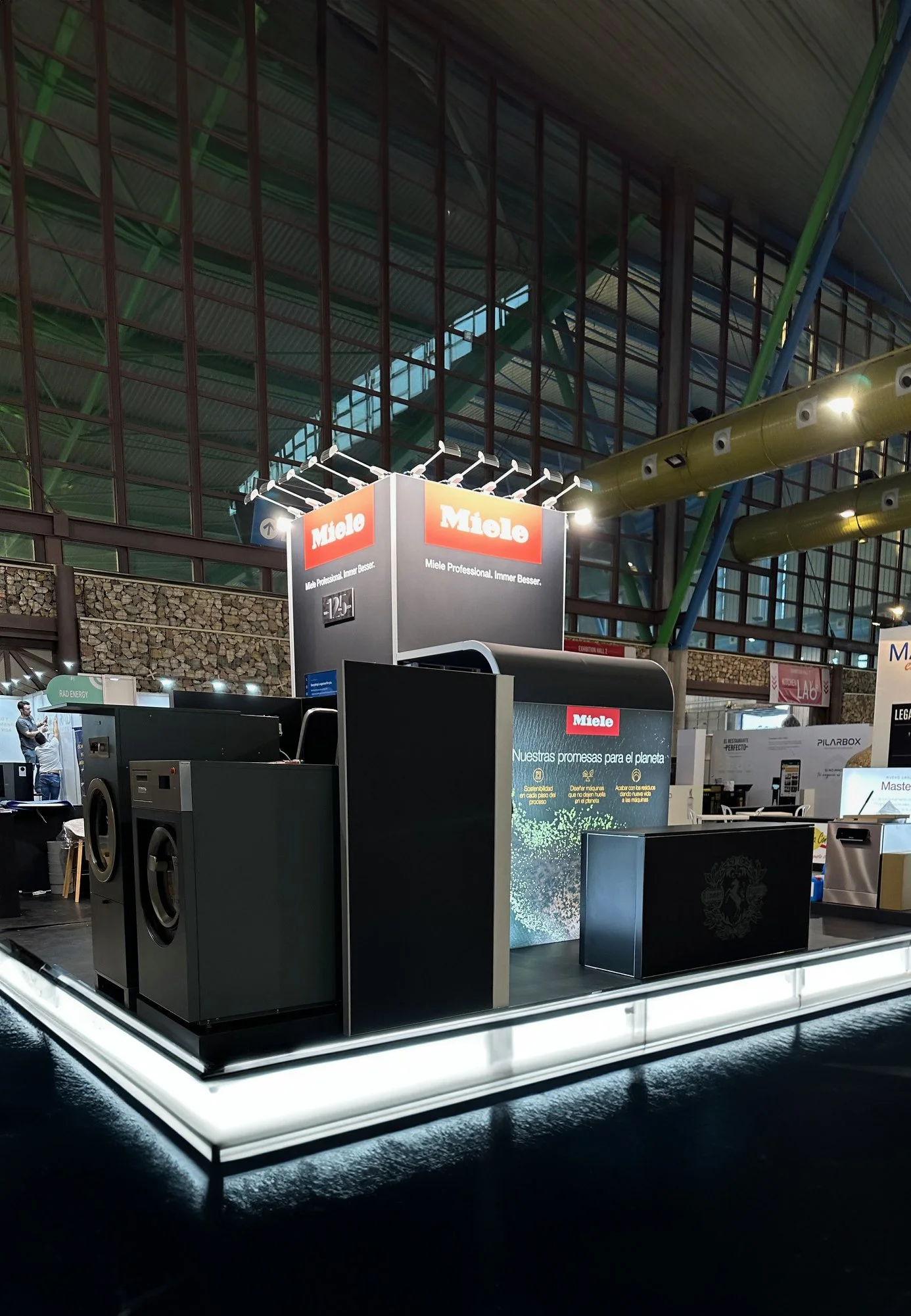Bespoke trade show stand featuring branded display structures and tailored exhibition production, designed to maximise brand visibility and visitor engagement.