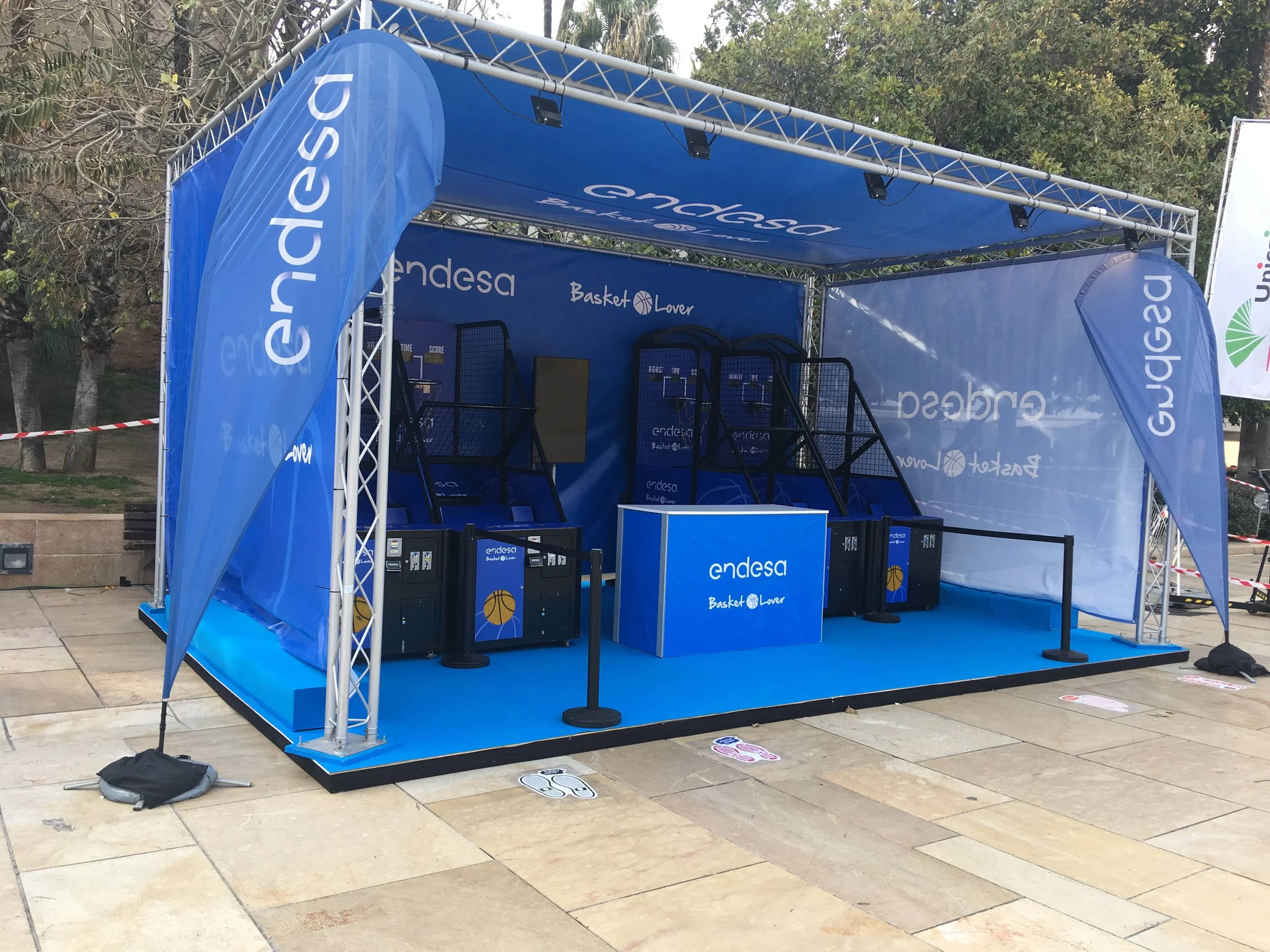Truss hire, printing and flooring. Stand for Endesa in Málaga.