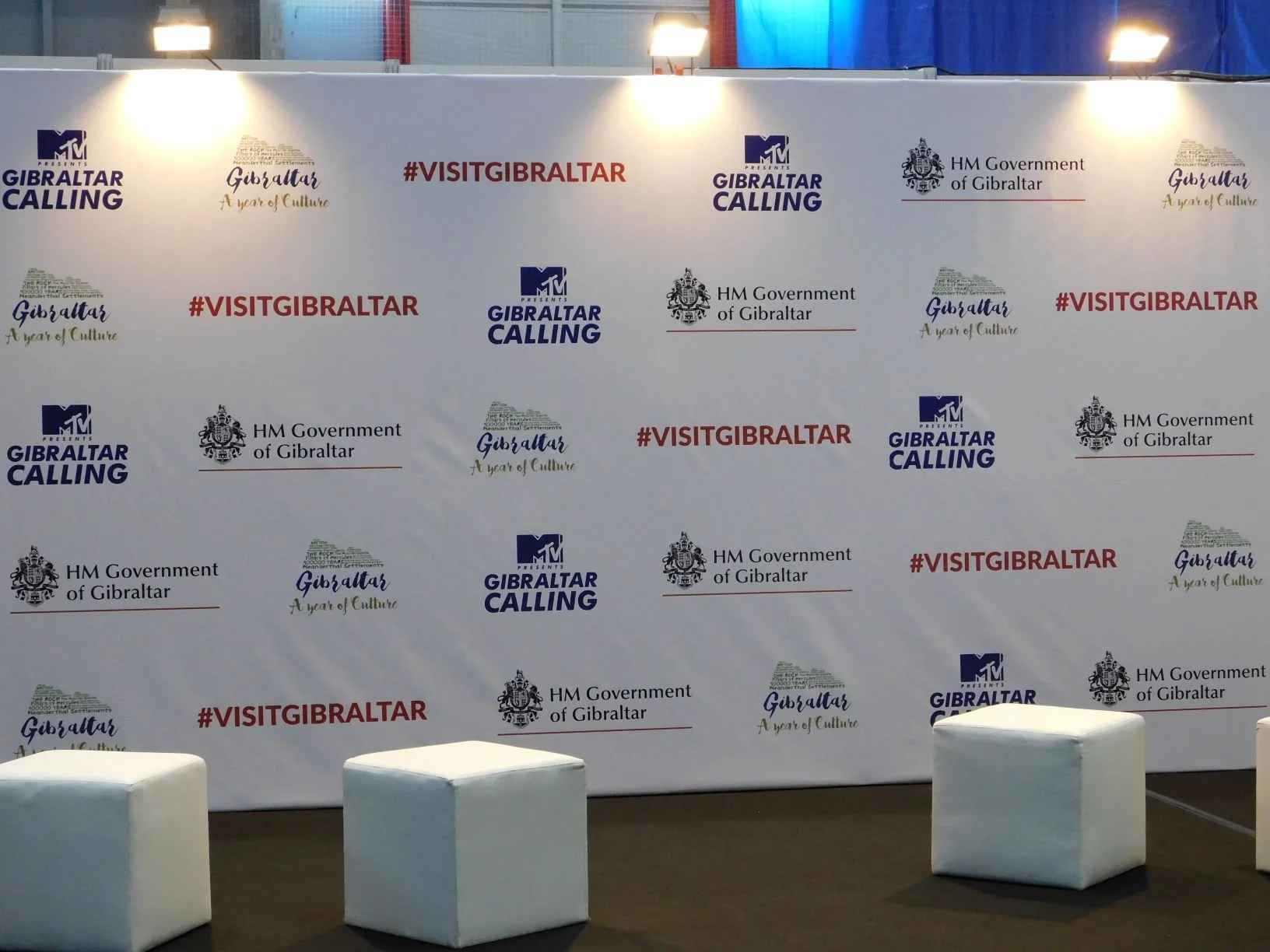 Hire and installation of backdrop, photocall featuring logos and text promoting Gibraltar tourism. Event materiales from expo imagen in Malaga, spain.