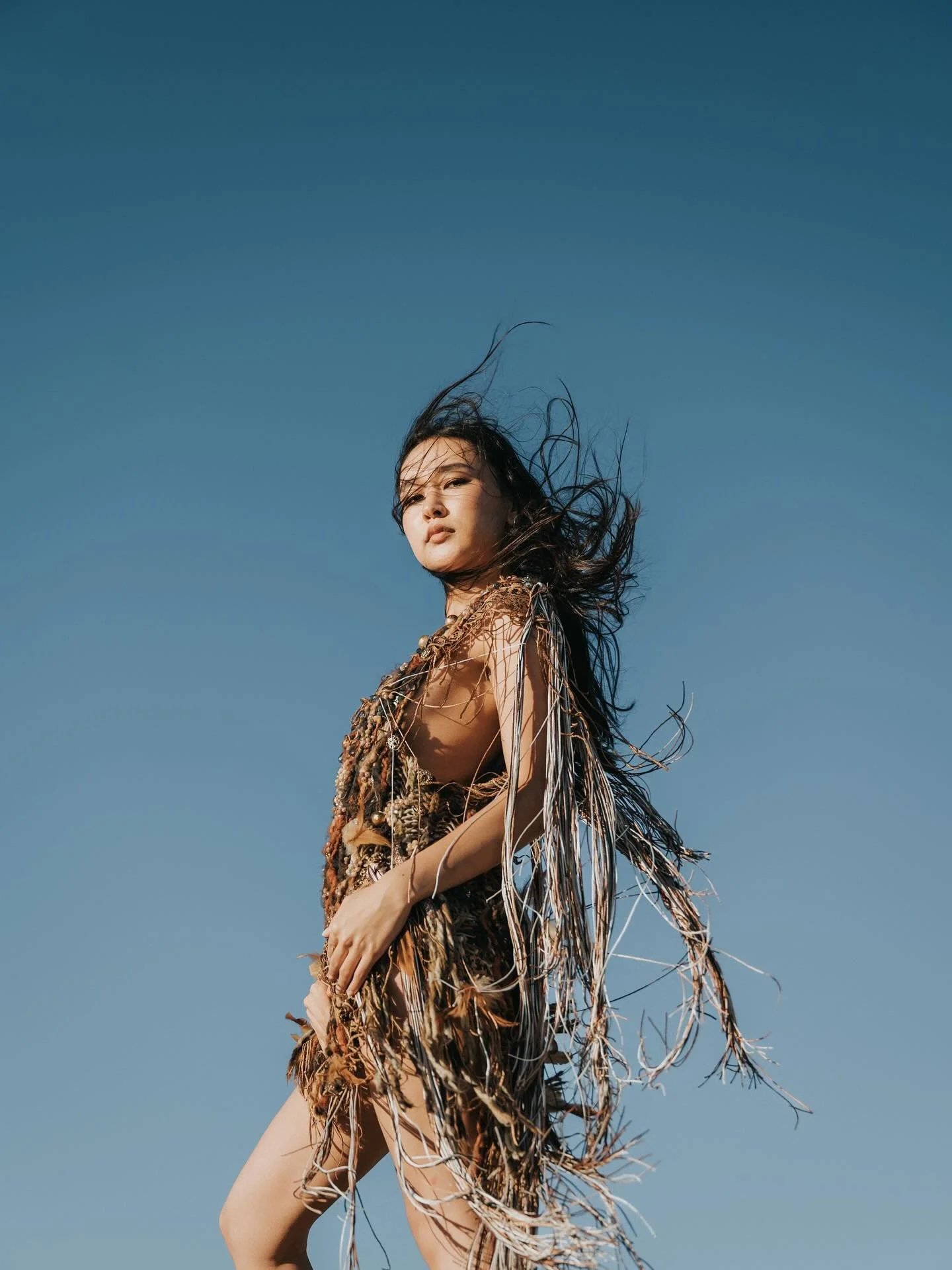 The cliffs were quiet that day, and she followed their silence as if it knew something she didn&rsquo;t&mdash;her woven dress was catching the wind, becoming part of the landscape.

Creative day with an amazing team. Thank you all.

Fashion designer:
