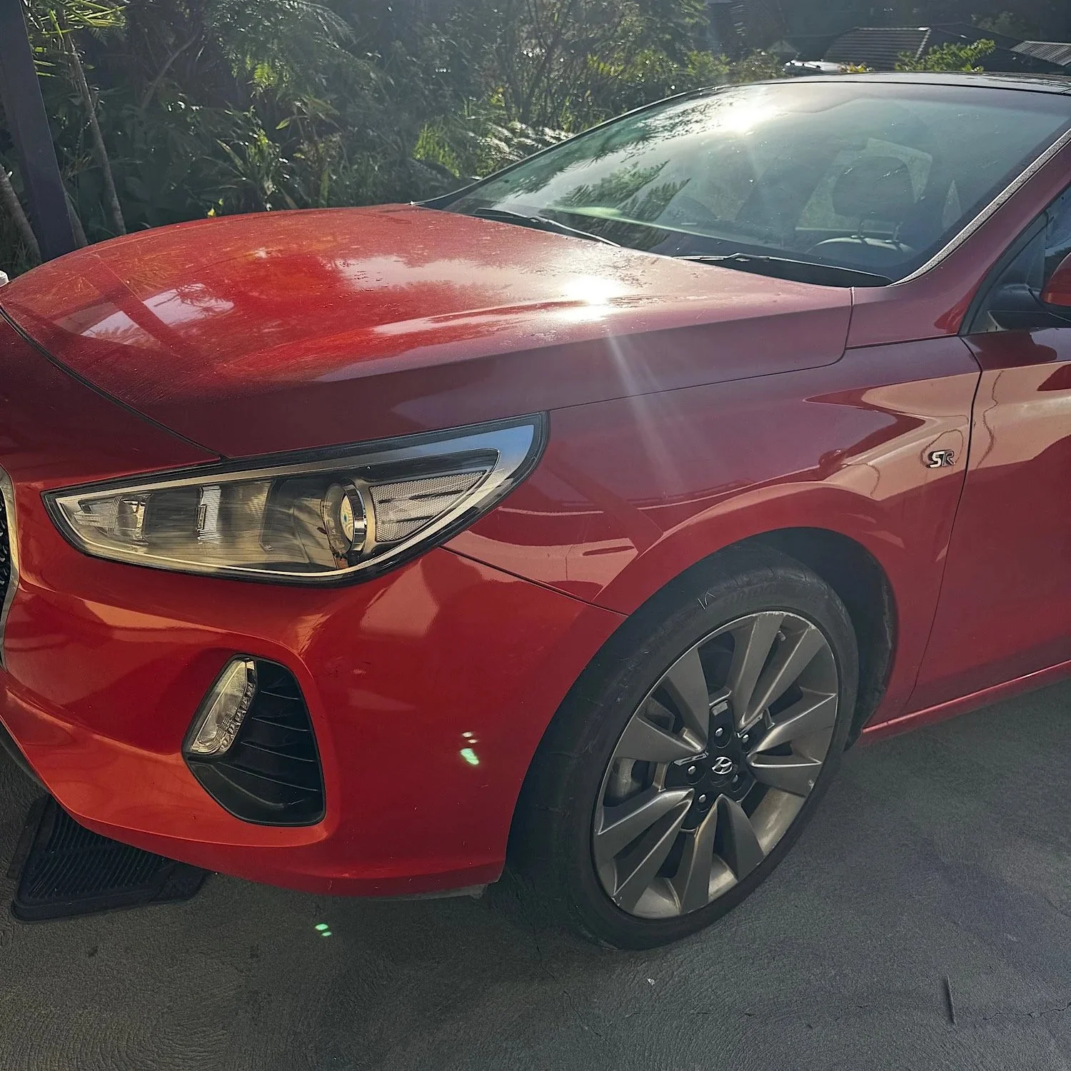 Hyundai i30 paint condition before correction showing light swirls and defects
