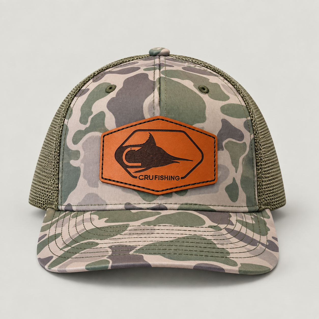 Camouflage Trucker Cap with Leather Fish Patch.png