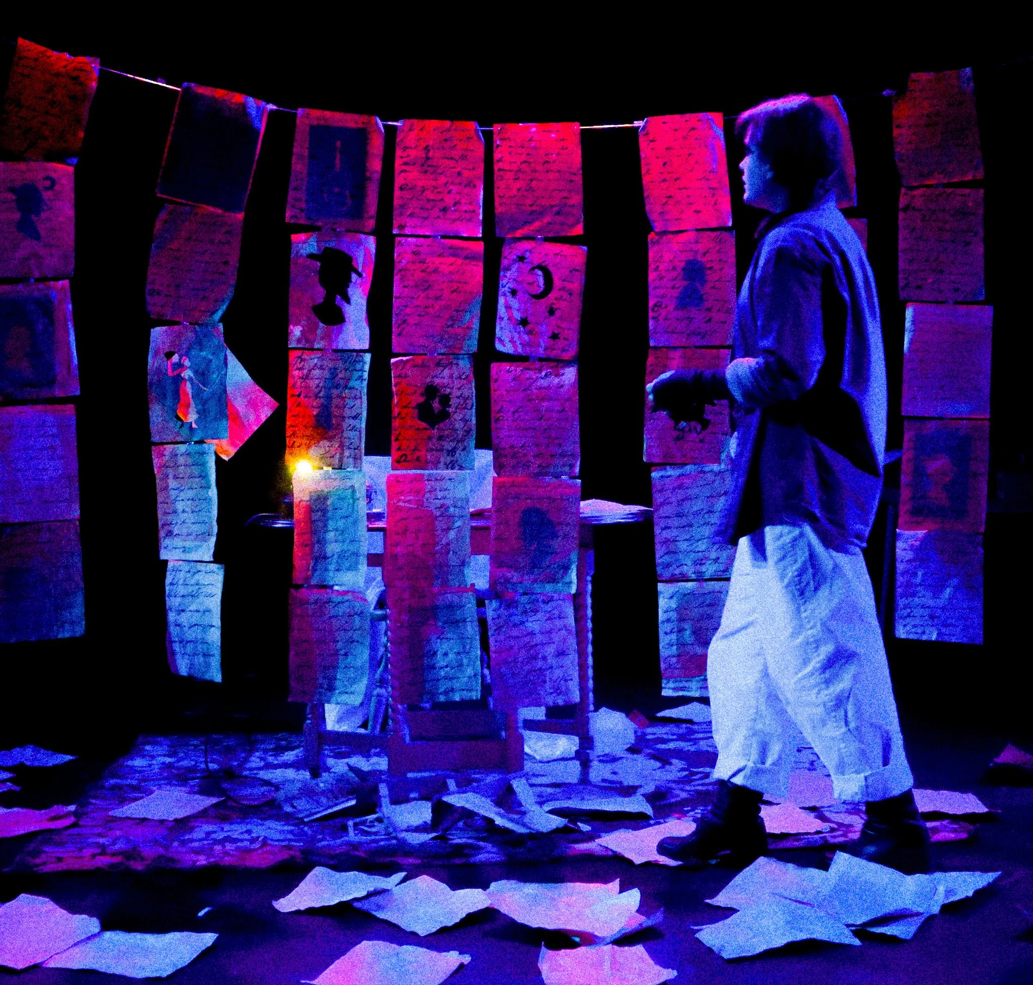 The Dark, ART New York: Written paper wall with silhouette cut outs 