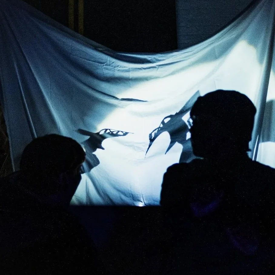 are you listening? The Makers Ensemble: broken bridge shadow puppet, poster board, plastic fork