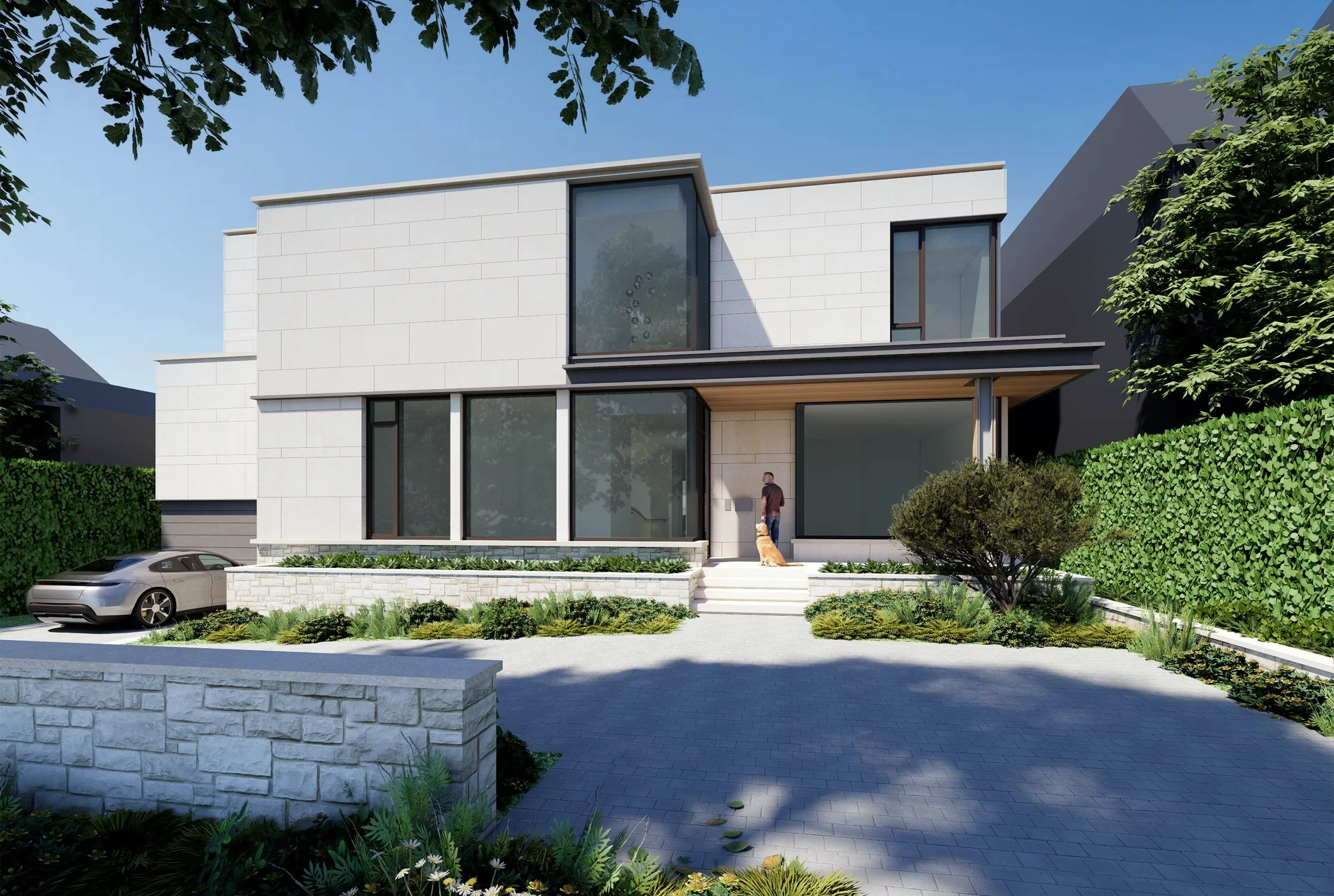 Modern white multi-story house with large windows, surrounded by green hedges and landscaped garden, with a parked silver car in paved driveway and a person standing near the front entrance with a dog.