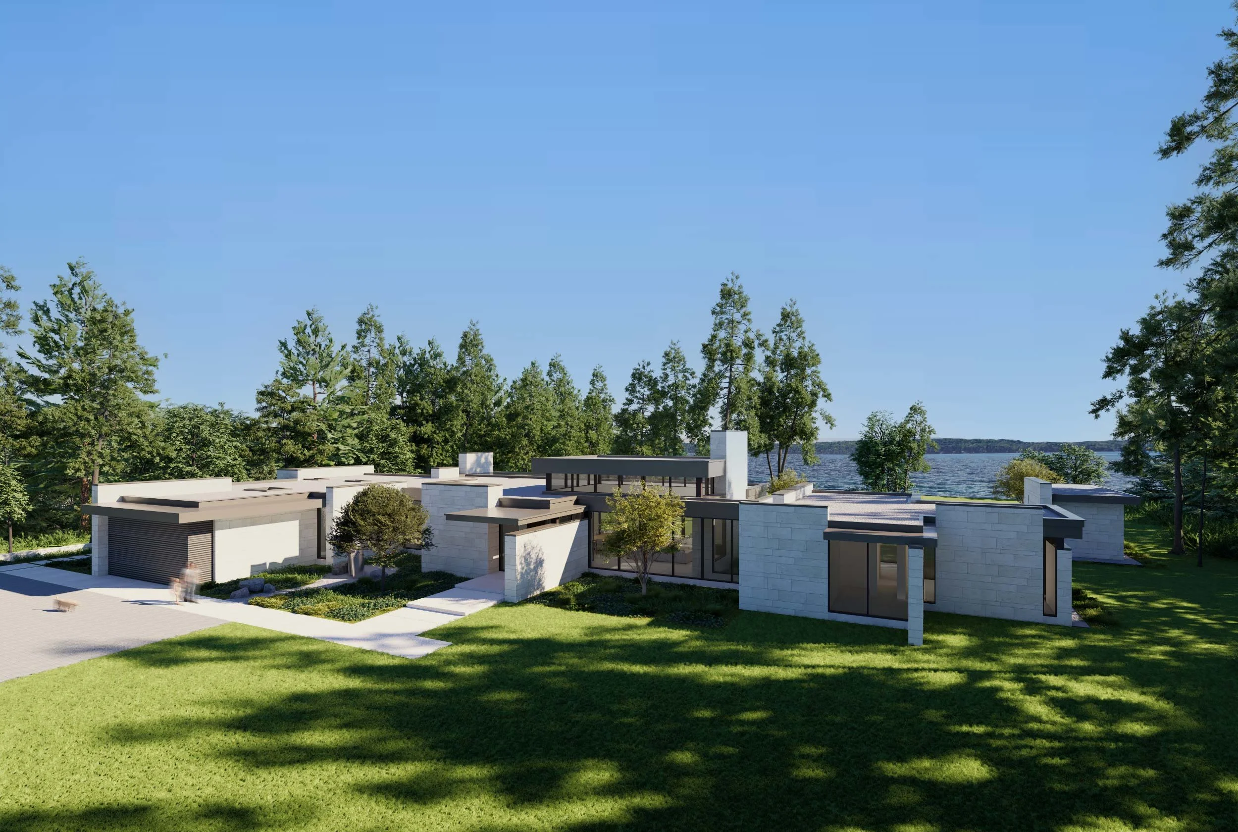 Modern single-story house with flat roofs, large glass windows, and a lush green lawn, situated near water and surrounded by trees under a clear blue sky.