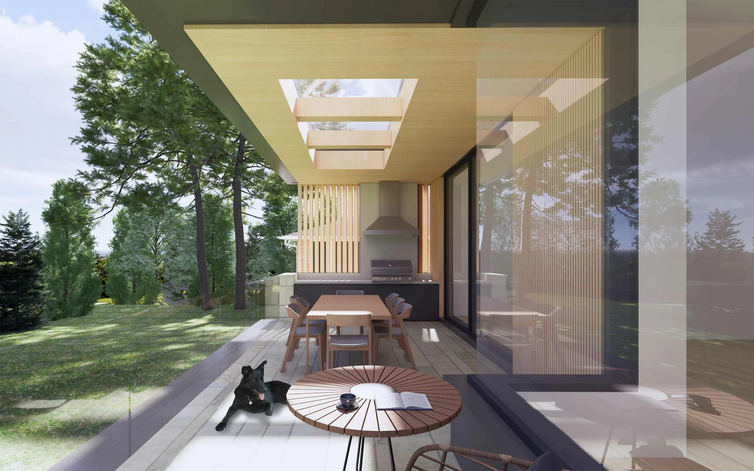 Modern outdoor patio with wooden furniture, a black dog, and surrounding green trees.