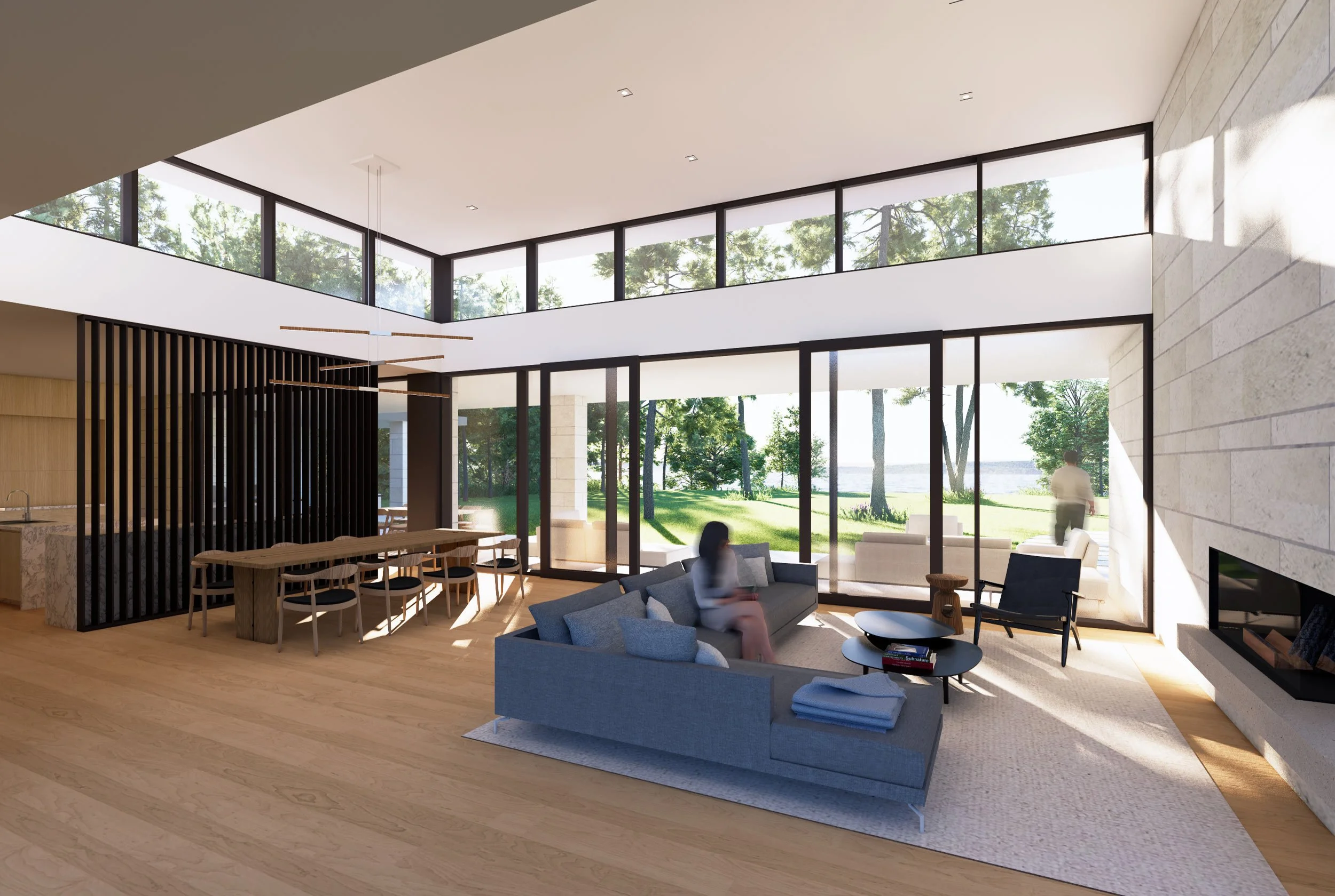Modern living room with large glass windows, gray sofa, black armchair, wooden coffee table, fireplace, and view of outdoor greenery.