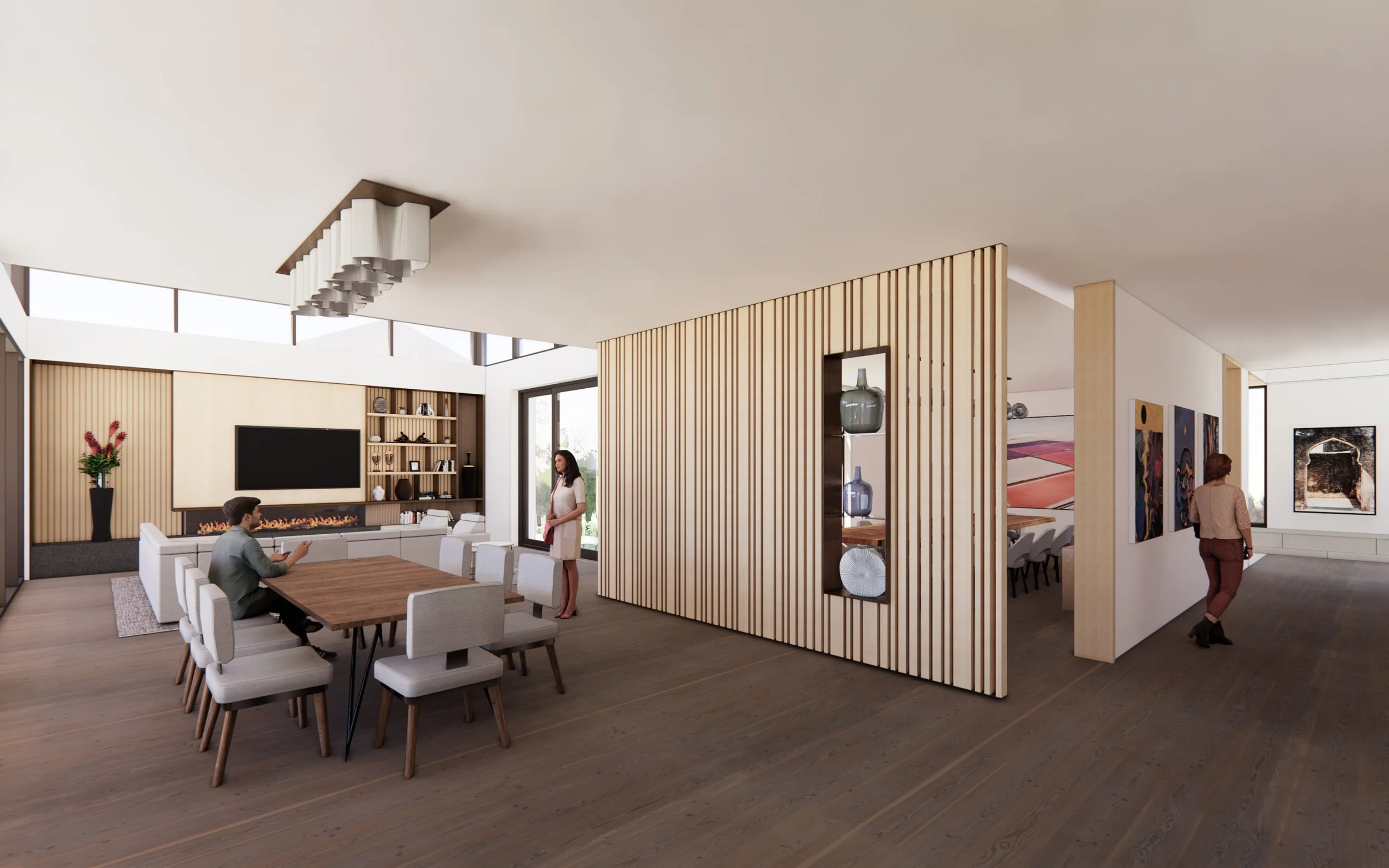 Modern open-concept living and dining room with wood accents, a large dining table with chairs, a fireplace, wall art, and people engaged in conversation and walking through the space.