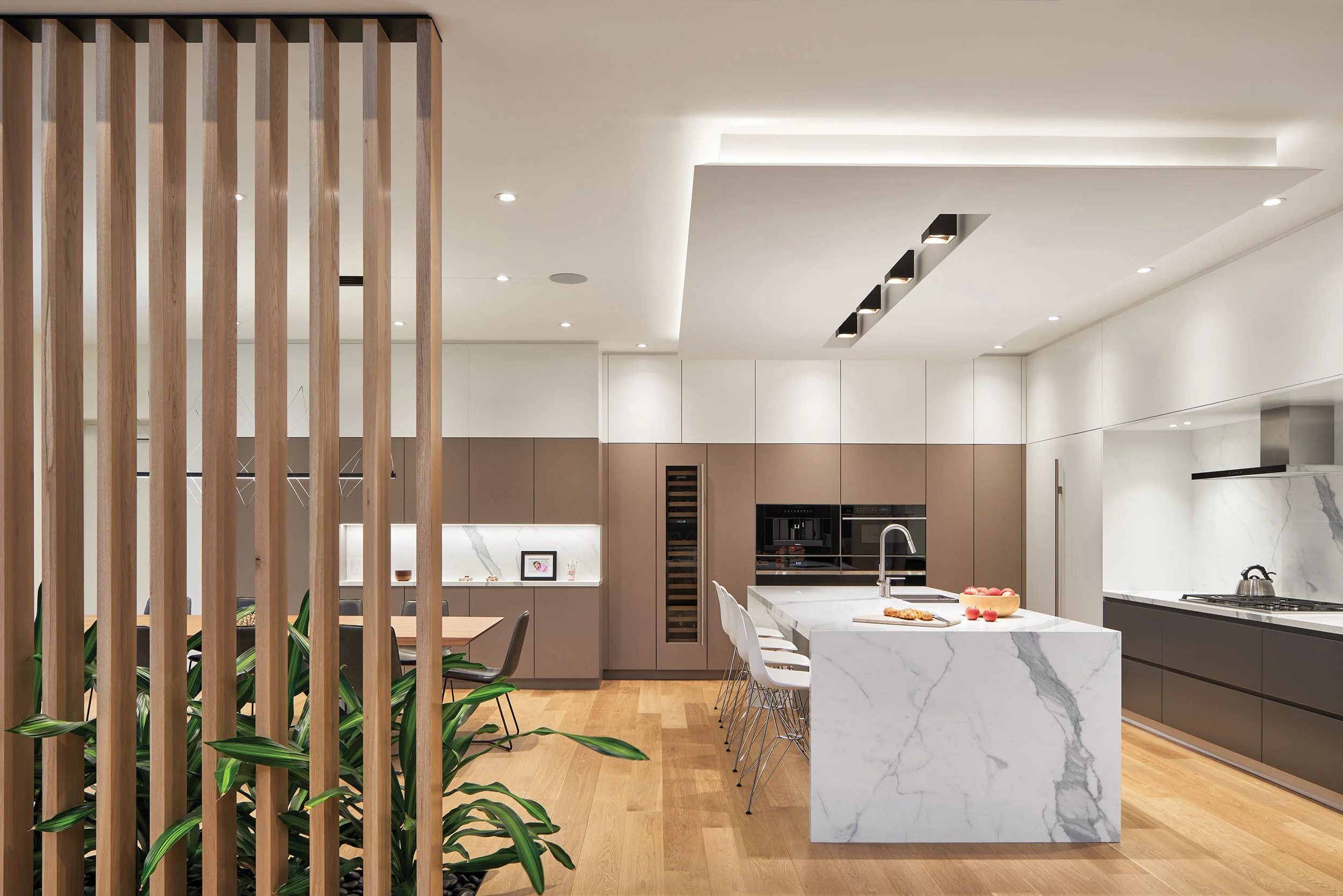 Kitchen and dining room with custom screen.