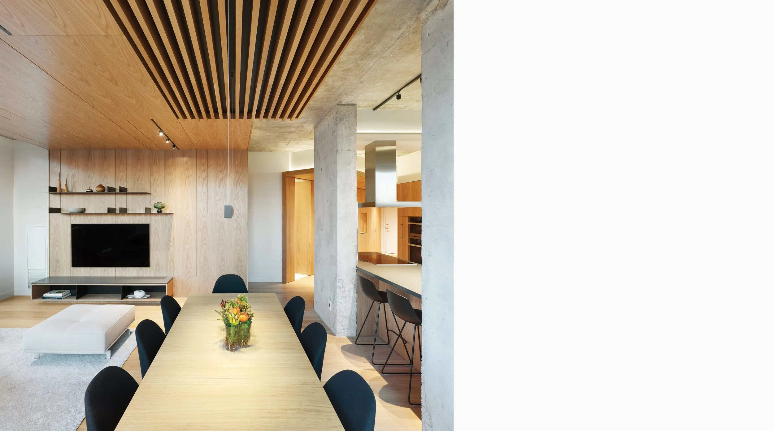 Bay Street Condo dining room table under wood slat ceiling