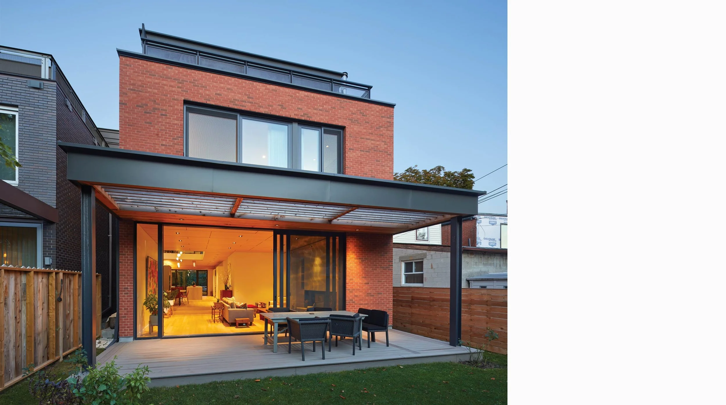 Robert Street Residence II backyard with patio and wood canopy