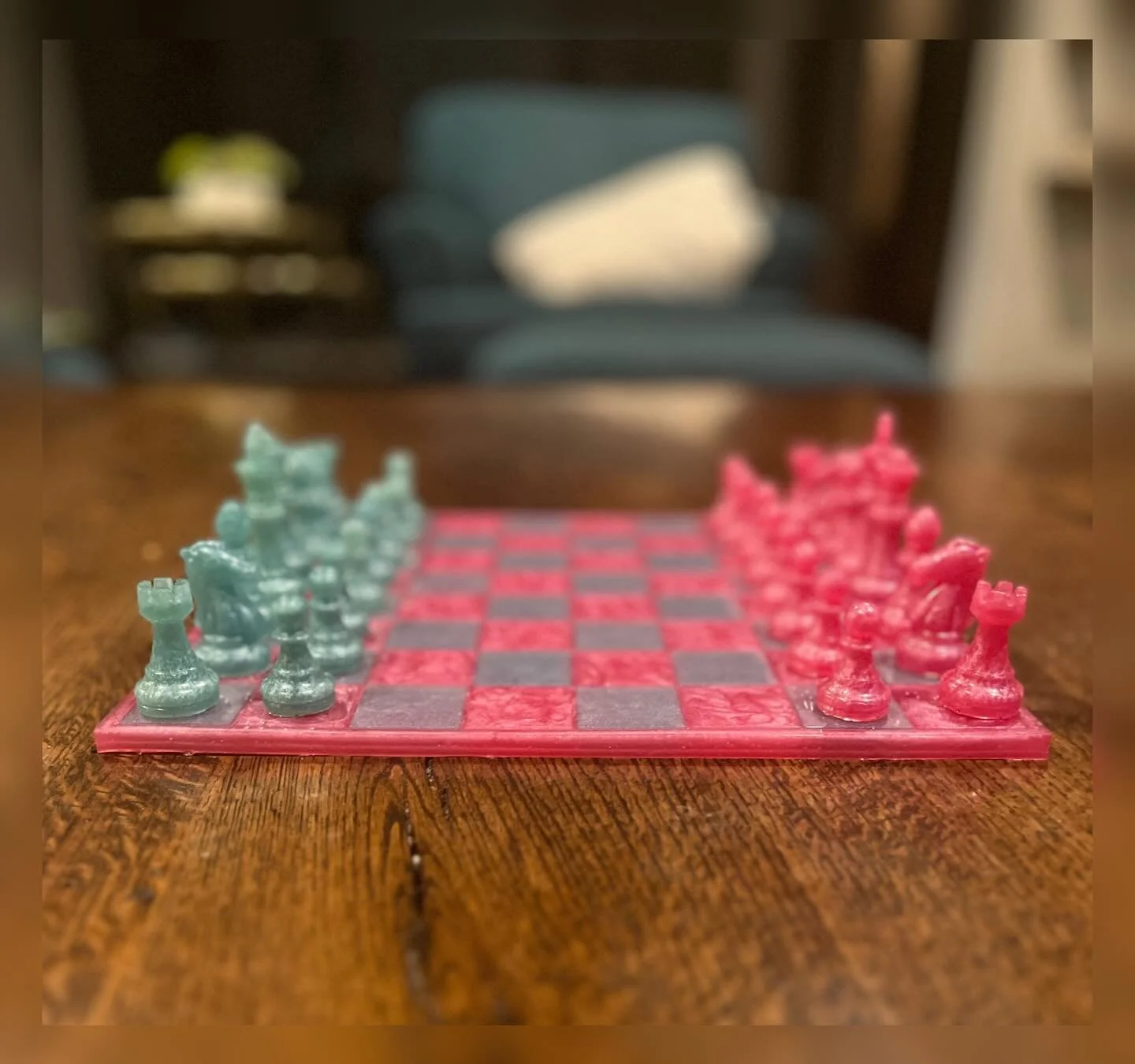 My 6 year old is really interested in chess so I made her a resin chess set with custom colors!  She chose teal and pink (great choices) and it came out so cute!