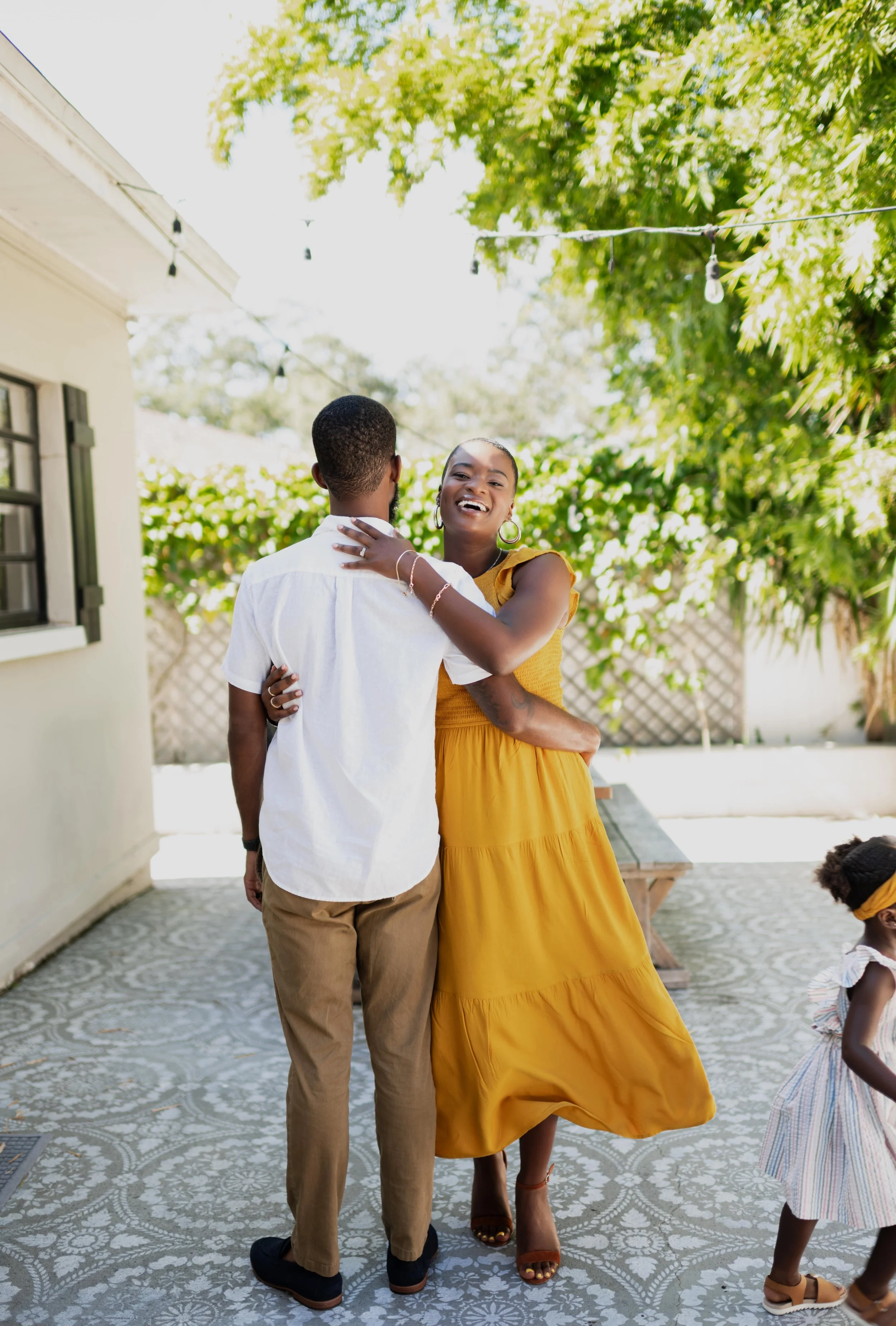 All-inclusive holistic doula Dee Larkin dancing with husband in Tampa.