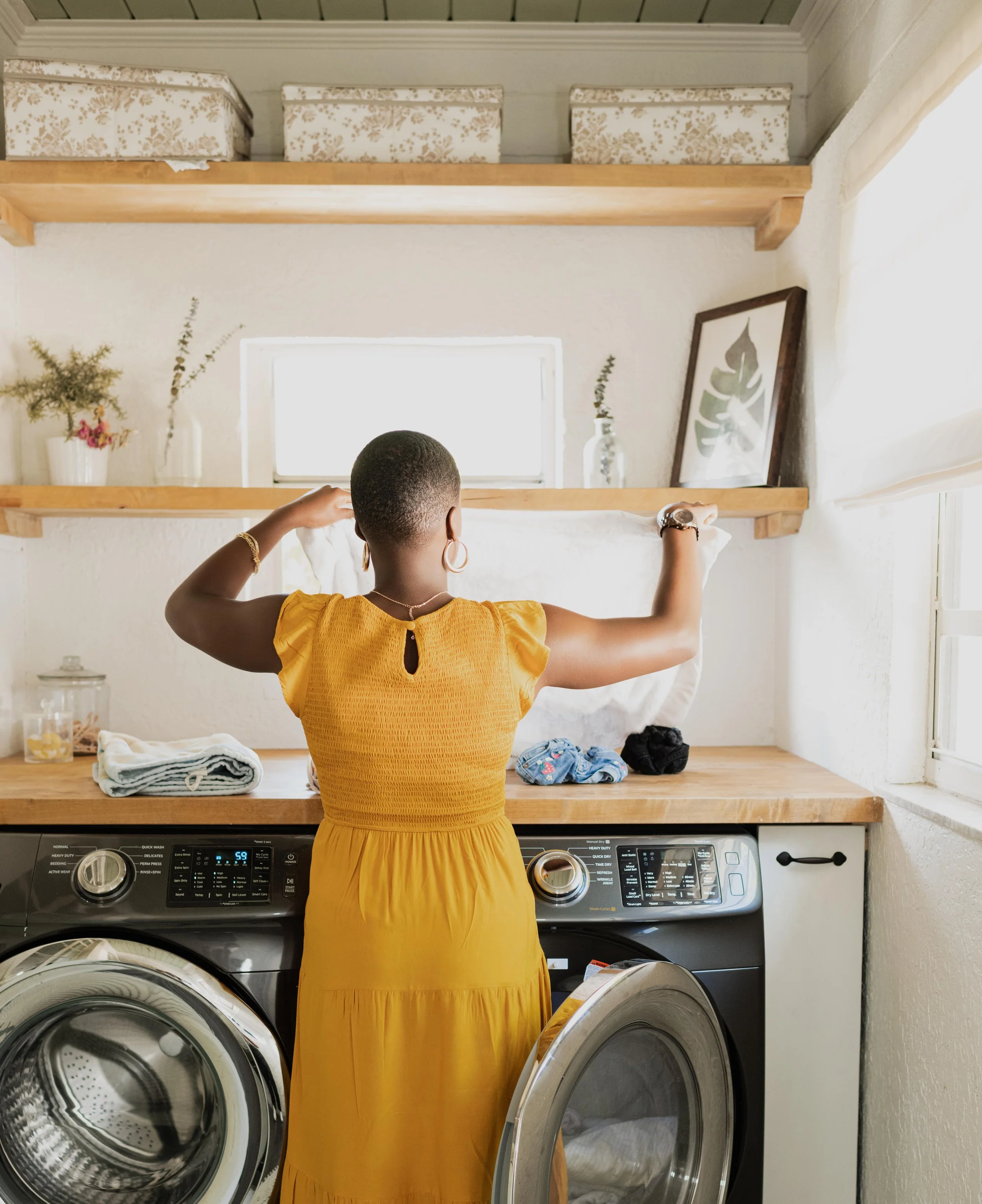 All-inclusive doula folding laundry in the Tampa Bay Area