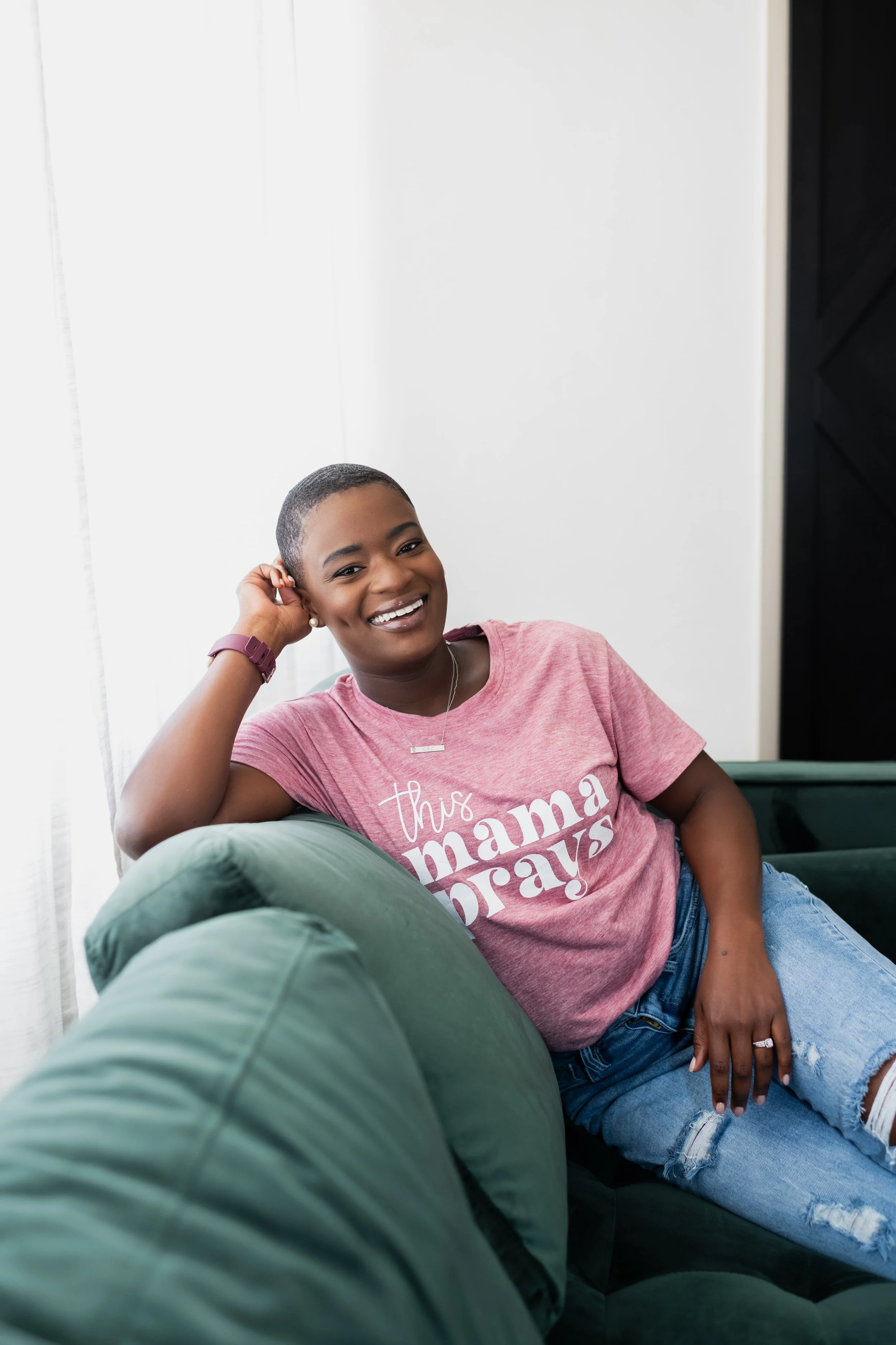 Florida Birth Doula Dee Larkin on couch in the Tampa Bay Area.