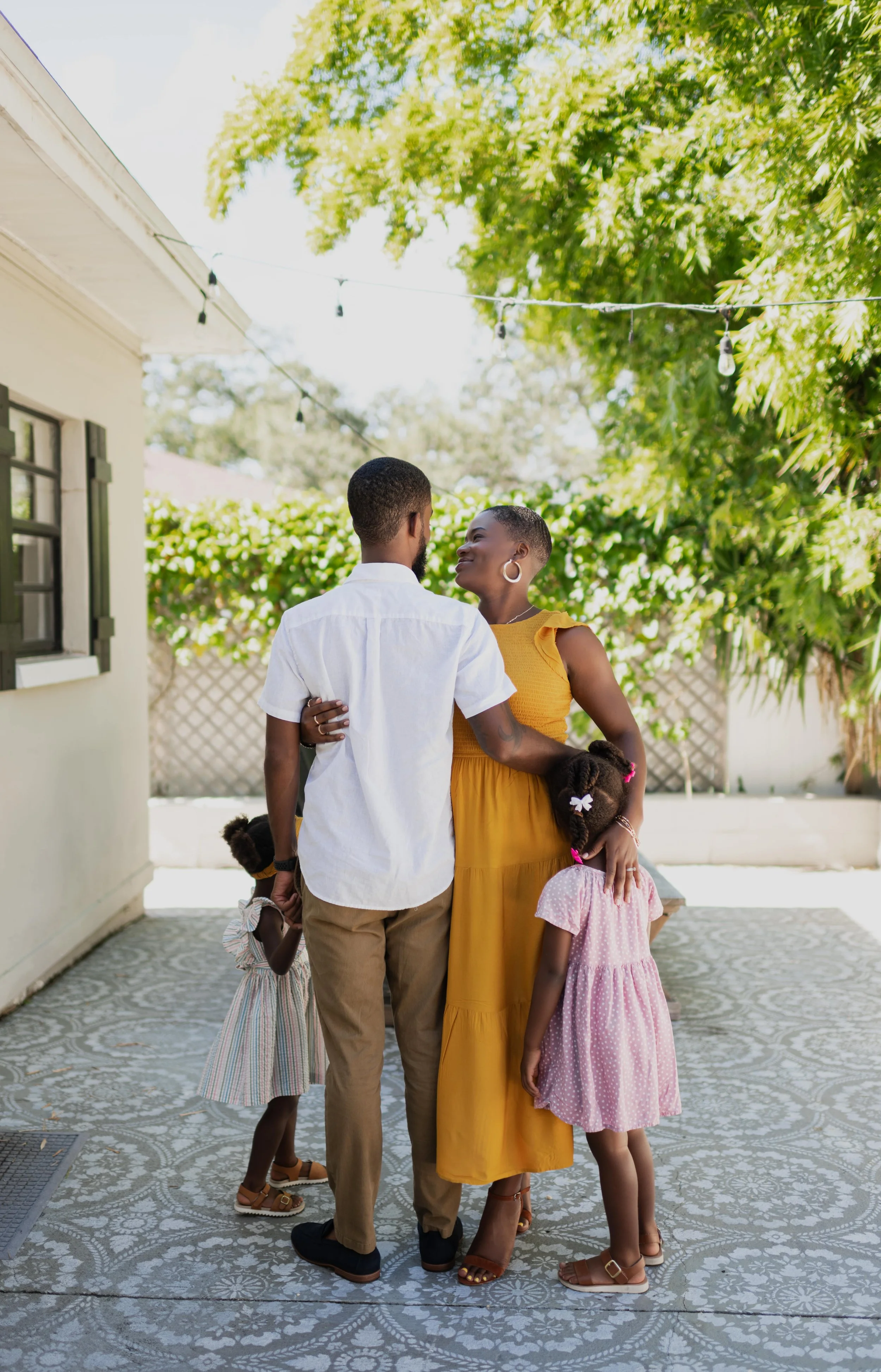 Doula Dee Larkin outside with husband and children in Tampa Bay Area.