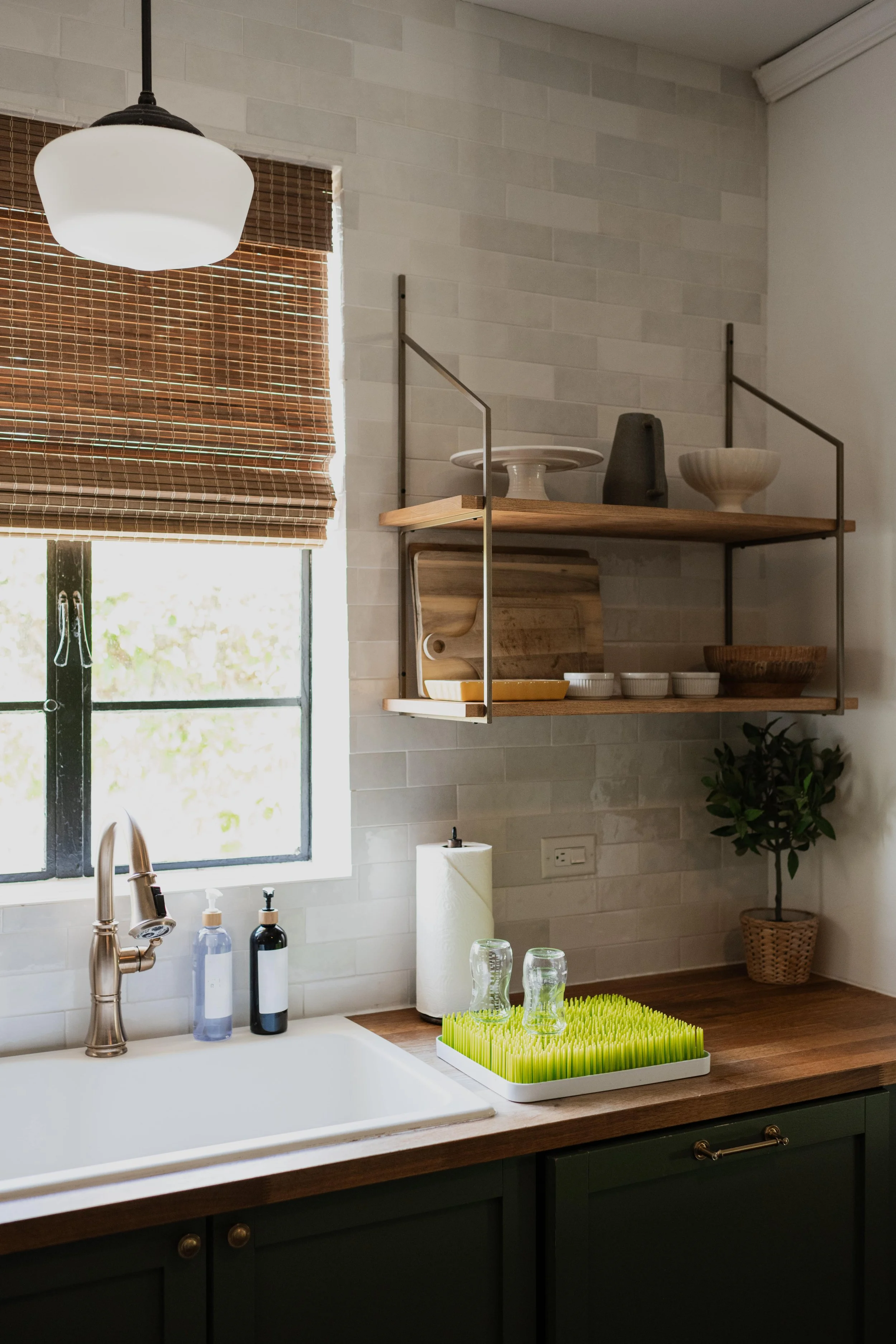 Bottles drying in kitchen in home in Tampa, Florida.