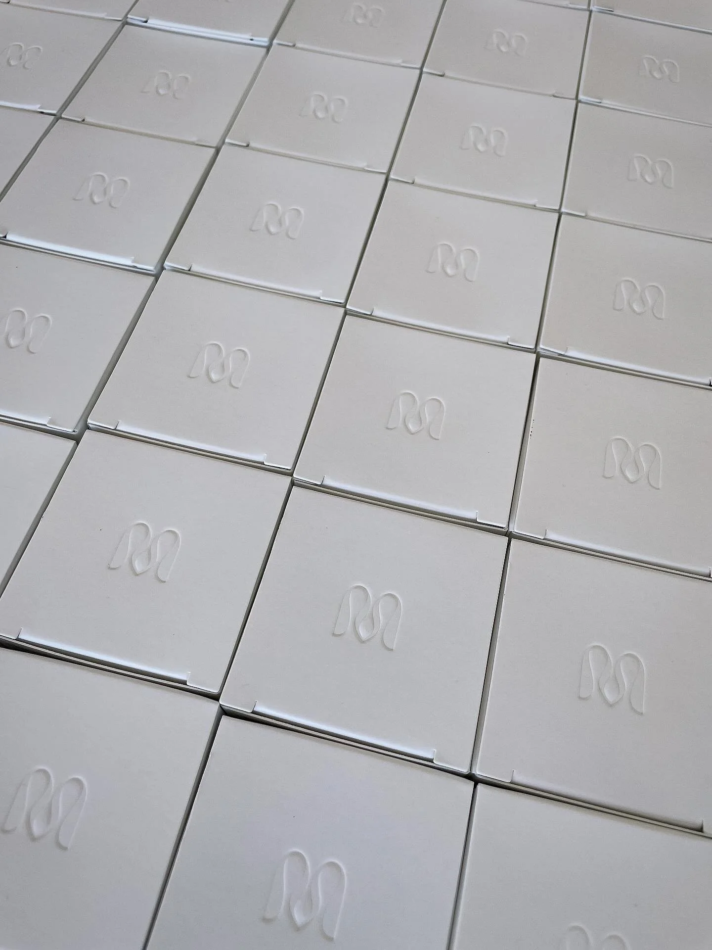 I’m very much in love with our logo mark. The stylised ‘M’ subtly echoes the form of the vulva, a deliberate design decision to bring visibility and respect to an area that is often overlooked. It represents our purpose - to change