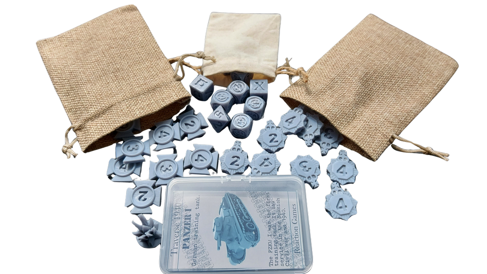 A collection of gray game pieces, small drawstring cloth bags, and a clear plastic card with the text "Traverse 1940," a tank illustration, and some informational writing, all on a black background.