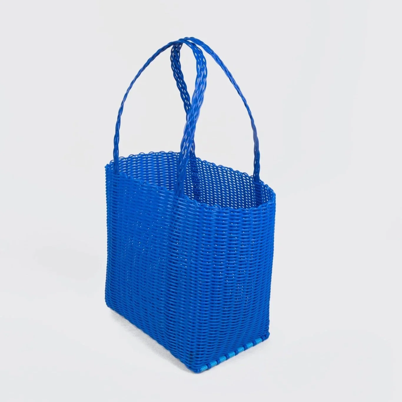 medium-blue-plastic-basket-side-rayascollective.jpg