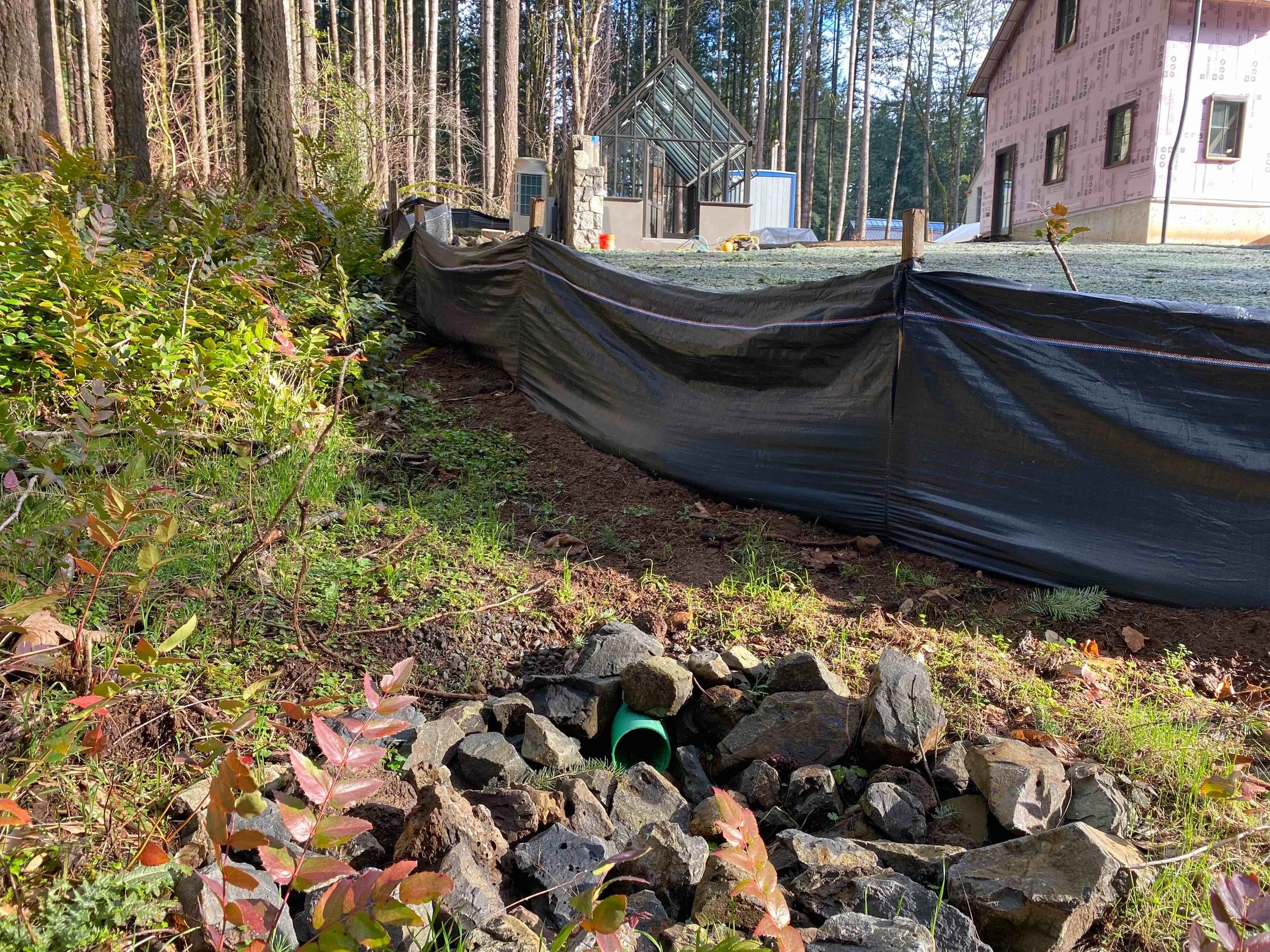 Silt fence for erosion control and stormwater pipe