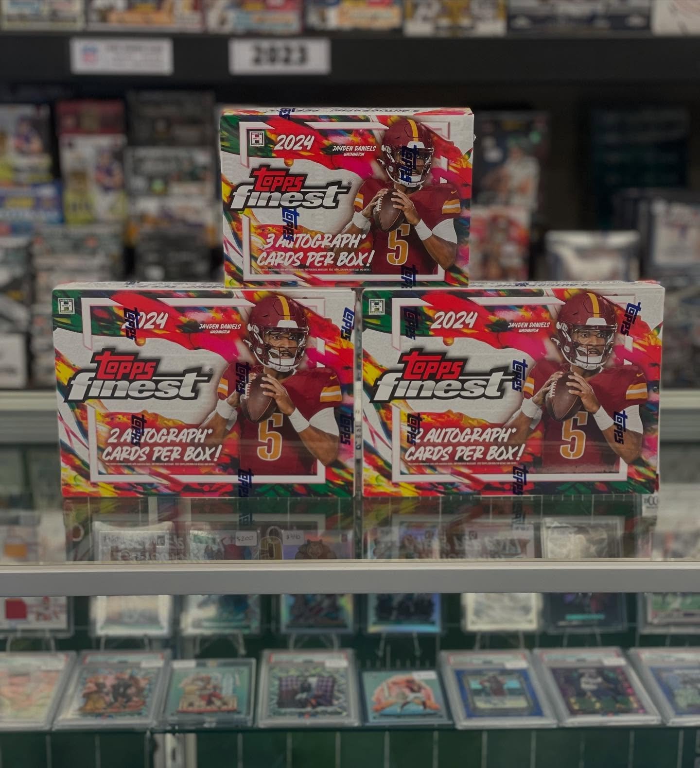2024 Topps Finest Football has arrived! 

With Topps Finest return to football look out for short prints Main Attraction, Bombardiers, The Man, For the Record, and others! 

Come grab a box today!