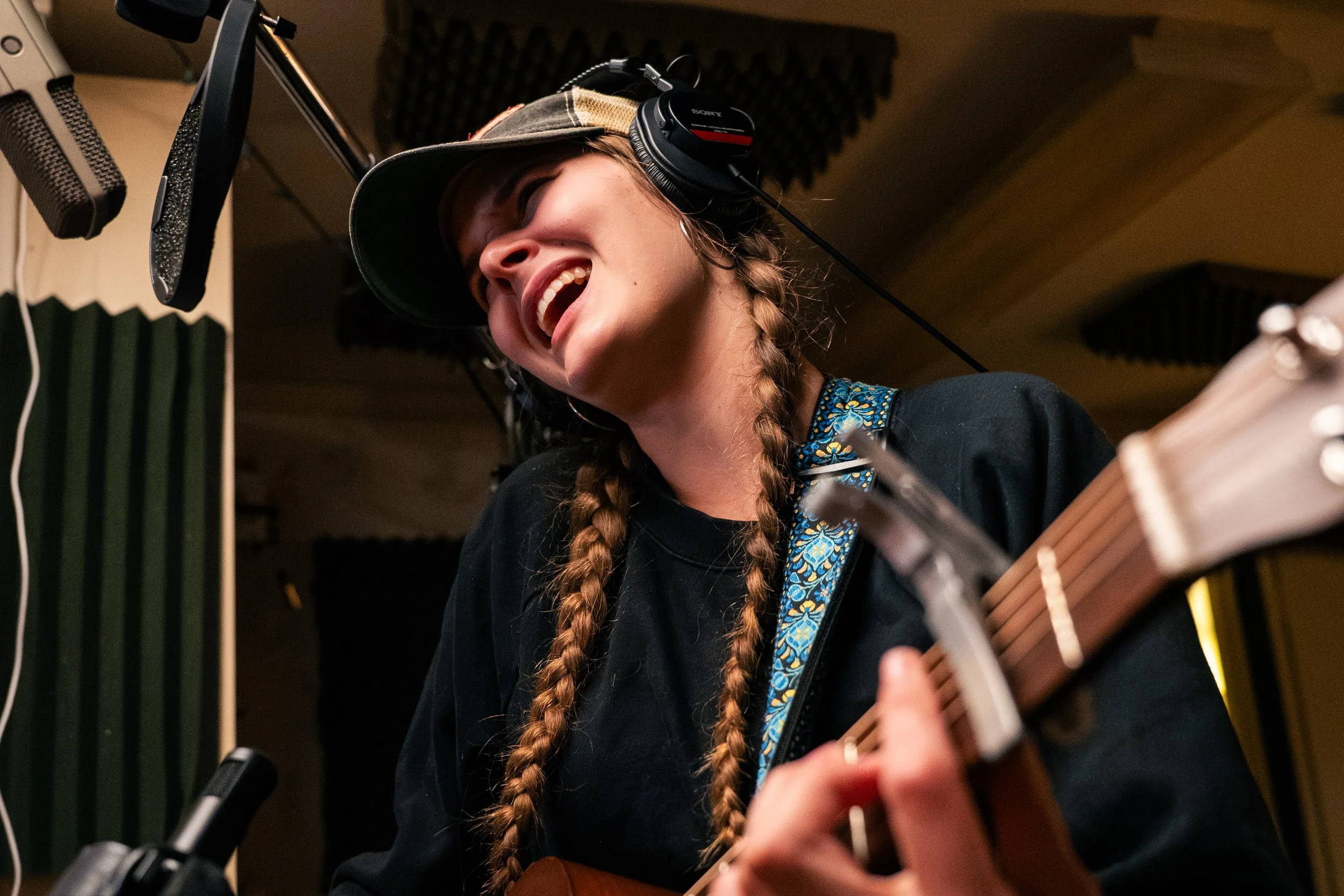 Winston-Salem, NC, Dec. 6, 2025 – Allyn records a take of her song in a isolation booth.