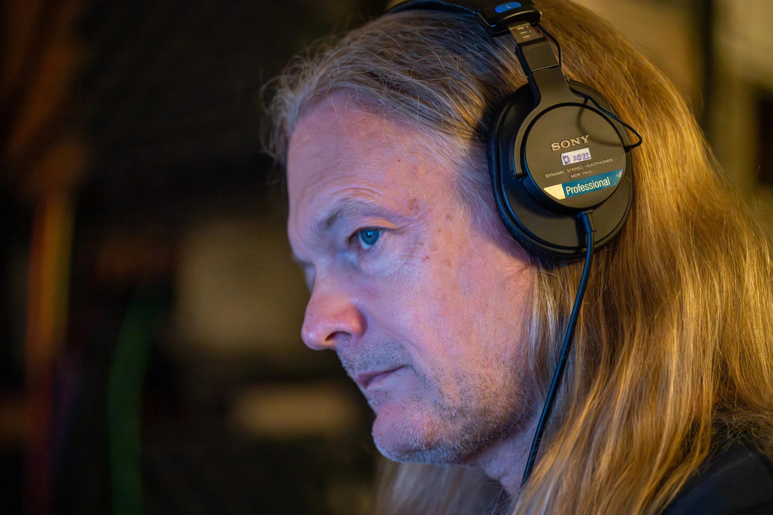 Winston-Salem, NC, Dec. 6, 2025 – Doug Williams focuses on perfecting a recording setup. 
