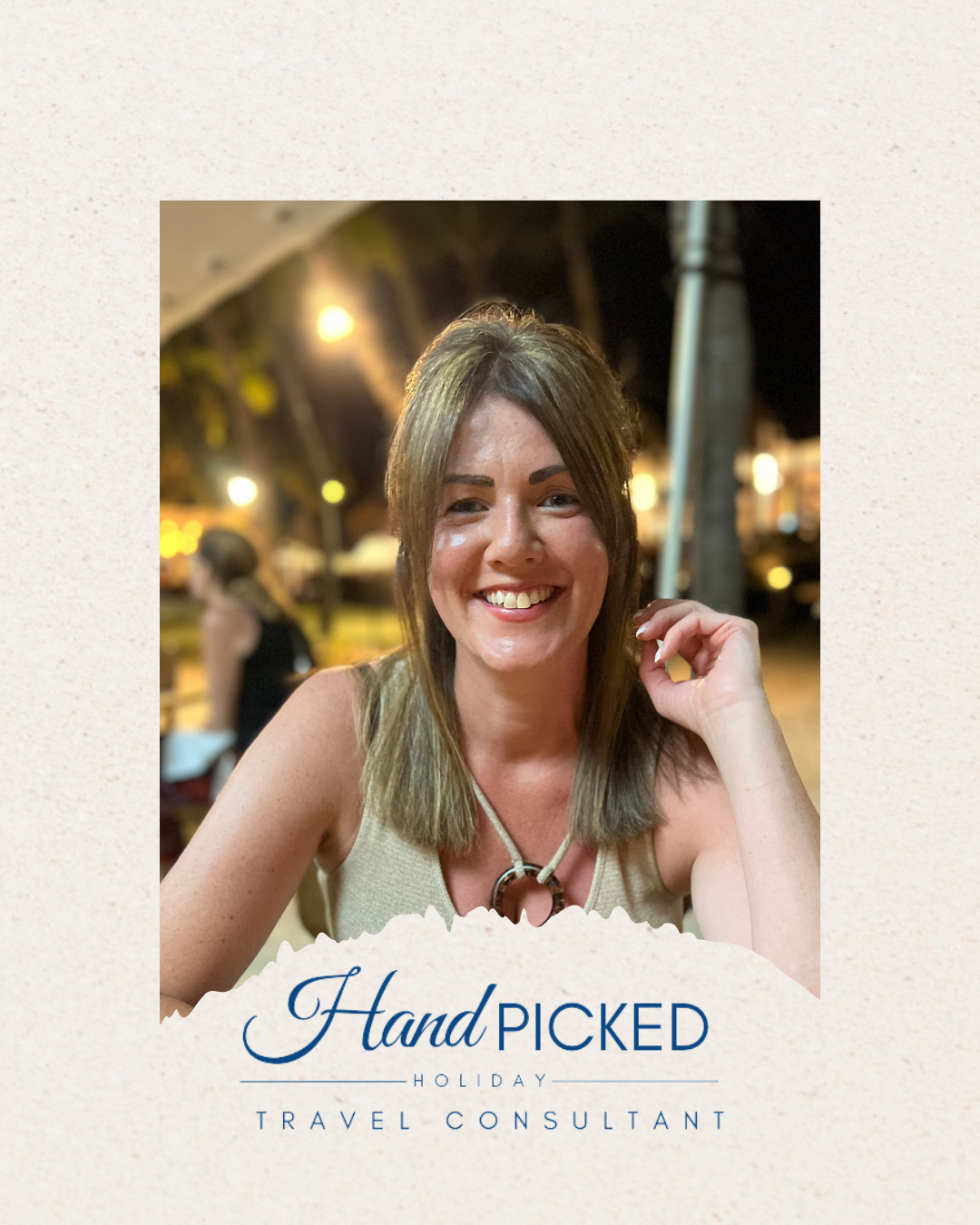 A smiling woman with shoulder-length brown hair and a beige top, sitting outdoors at night with blurred lights and trees in the background, promoting a travel consultant service.