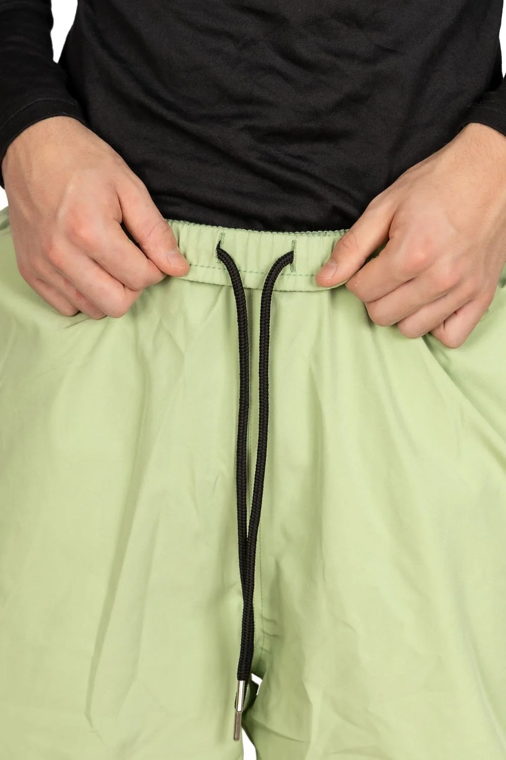 Close-up of internal waist drawstring inside Mist Green Snowripper Drift Pants.