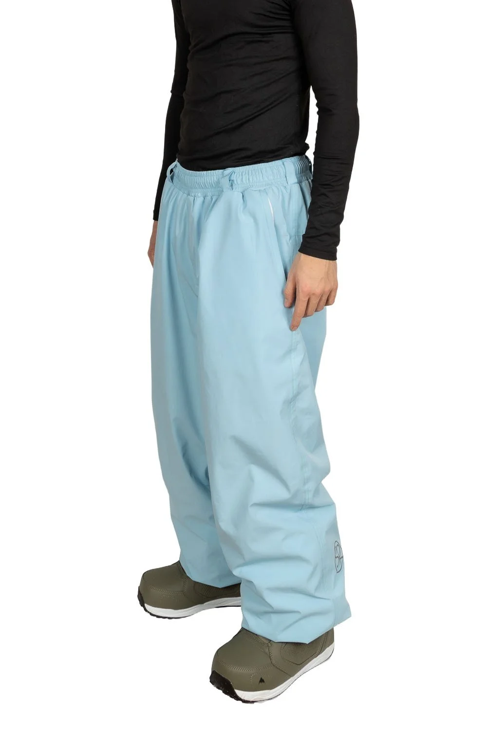 Front angled view of Snowripper Drift Pants in Ballad Blue showing full snowboard silhouette.